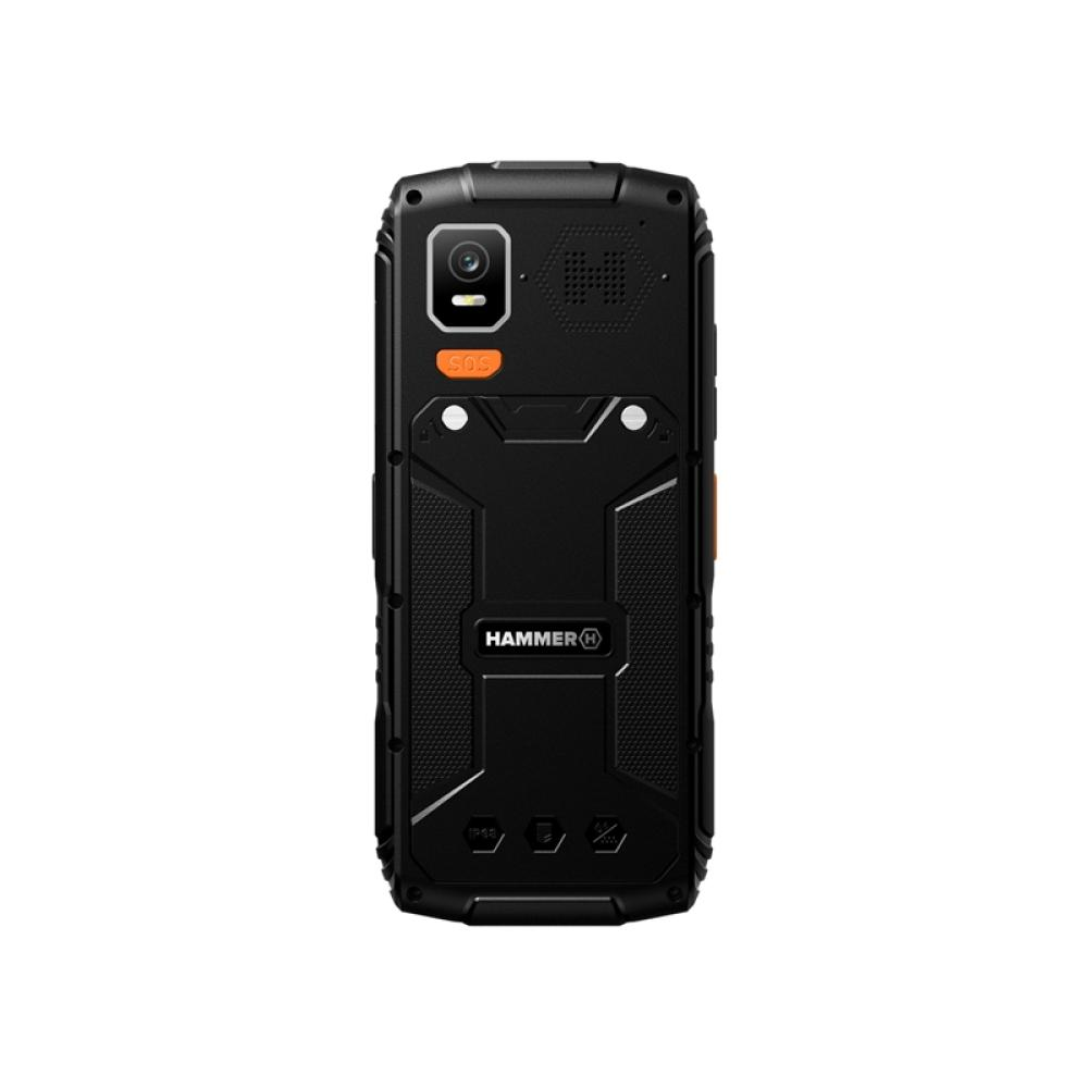 Teléfono Hammer negro. Cuenta con cámara, botón SOS naranja y diseño robusto. La marca es visible.