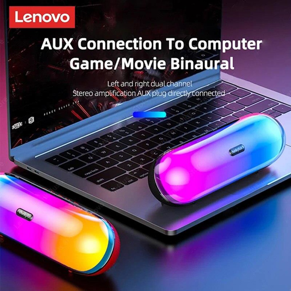 İki renkli ses cihazlı dizüstü bilgisayar. Üstte Lenovo logosu. Metin: Bilgisayara AUX bağlantısı, oyun/film binaural.