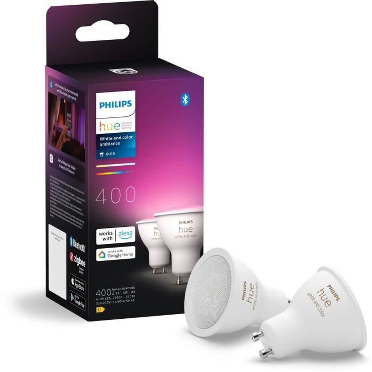 Pudełko z lampkami Philips Hue. Białe światła, pudełko jest fioletowe i białe. Dwie lampki są przed pudełkiem.