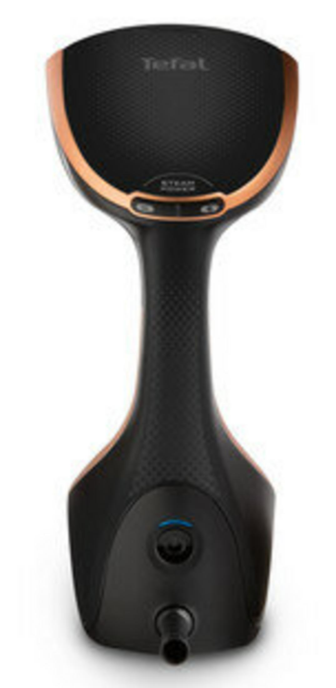 Ręczny parownik Tefal. Jest czarny ze miedzianymi akcentami, posiada przycisk pary i wylot wody.