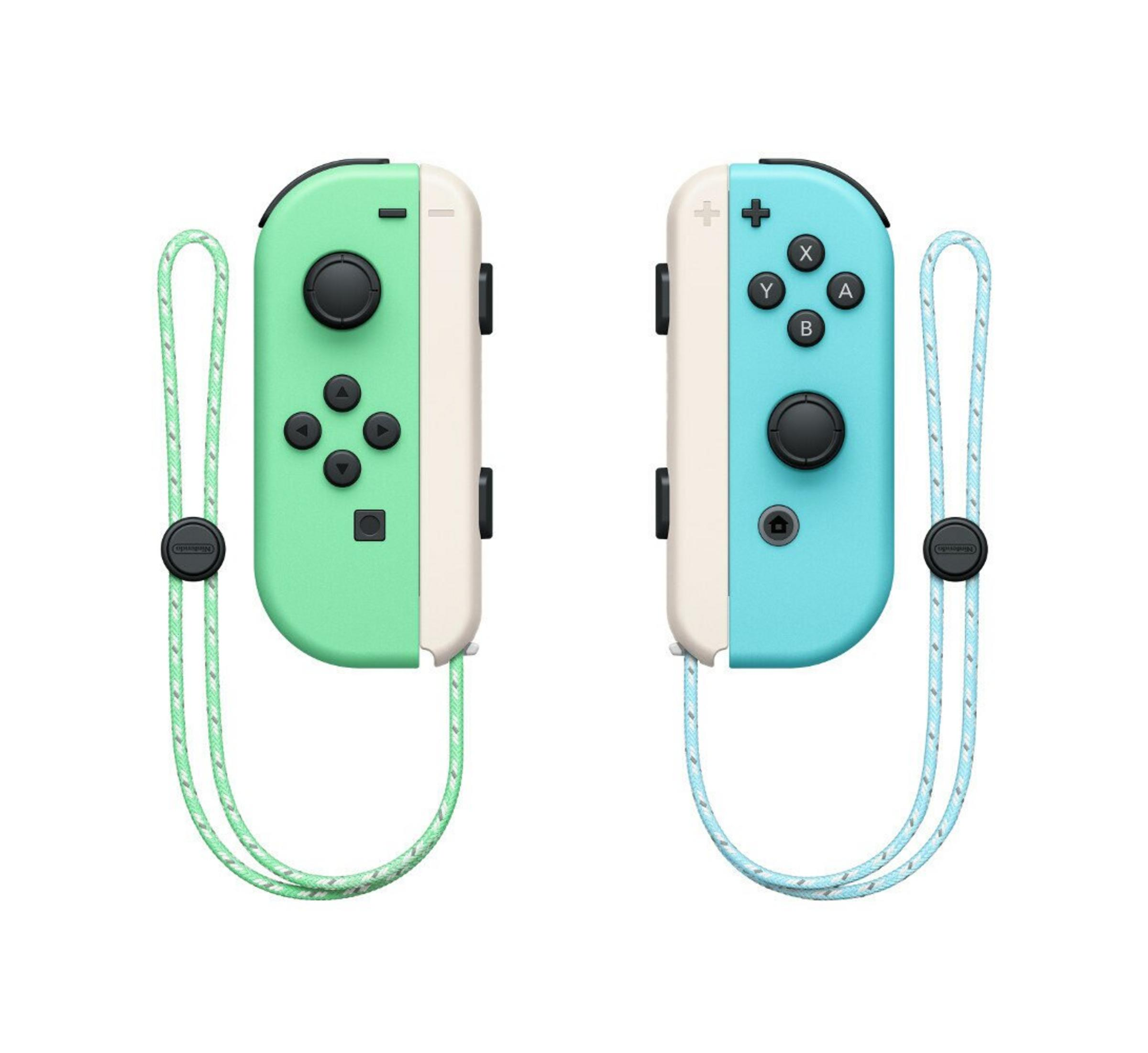 Zwei Nintendo Switch Joy-Con-Controller. Einer ist grün, der andere blau. Beide haben Handschlaufen.