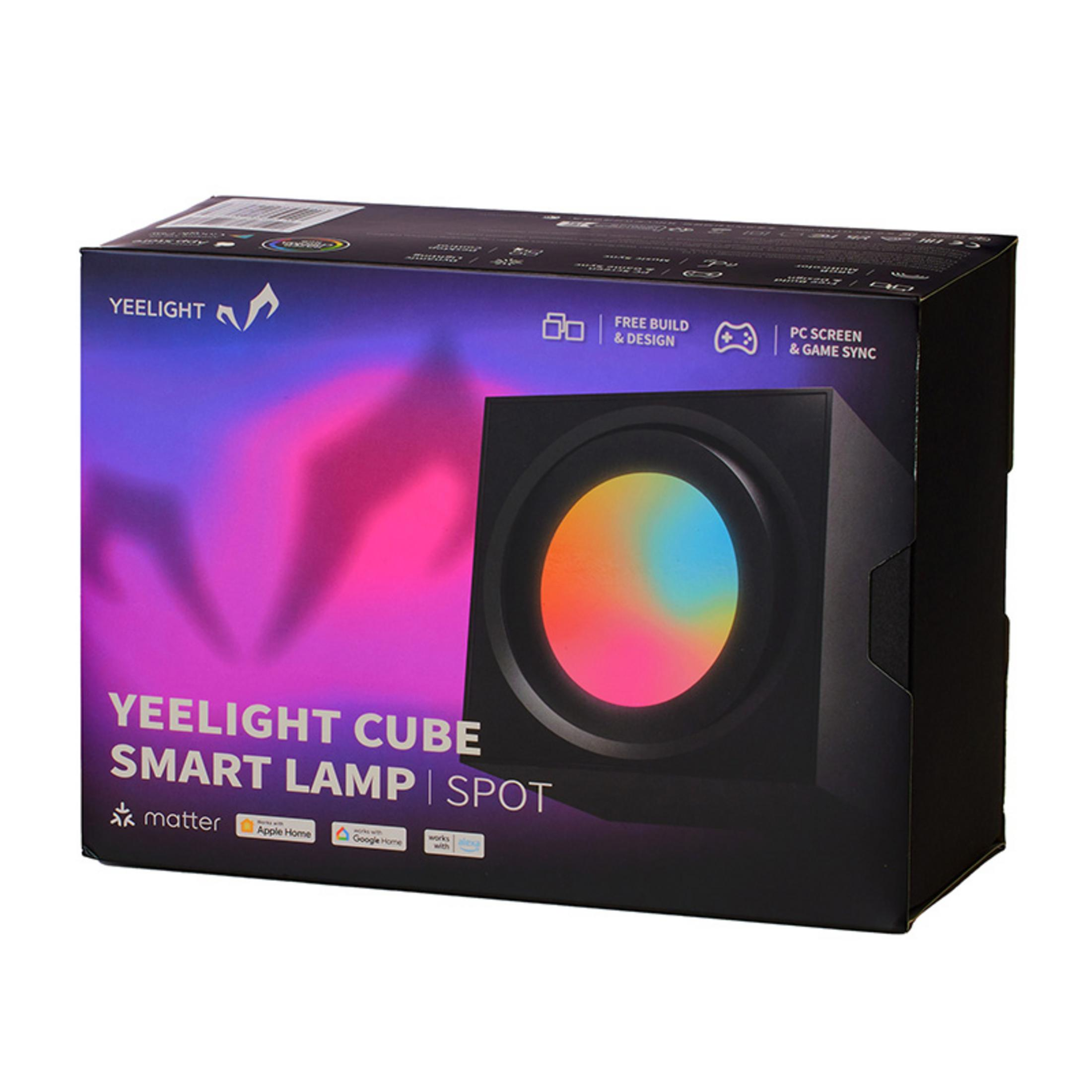 Pudełko do Yeelight Cube Smart Lamp. Czarne tło z wielokolorowym światłem w kształcie kostki. Tekst: 'Yeelight' i 'Spot'.