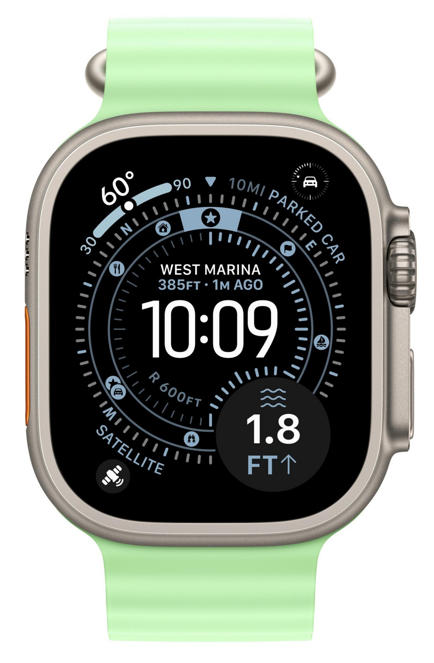 Nahaufnahme einer Smartwatch mit grünem Armband. Der Bildschirm zeigt Zeit, Standort und andere Daten an.