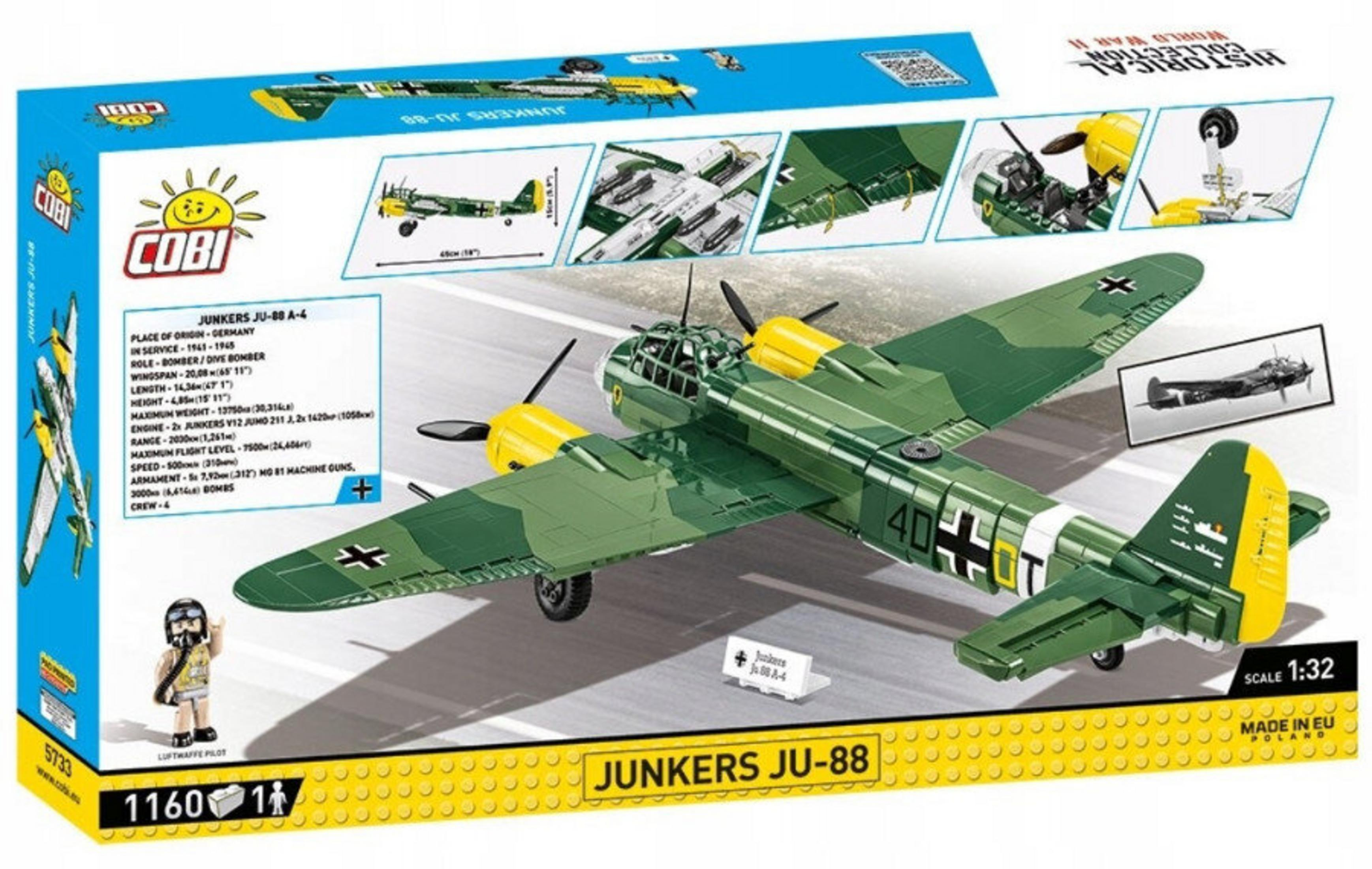 Zielony i żółty samolot zabawka jest na pudełku. Pudełko ma zdjęcie samolotu i pilota.