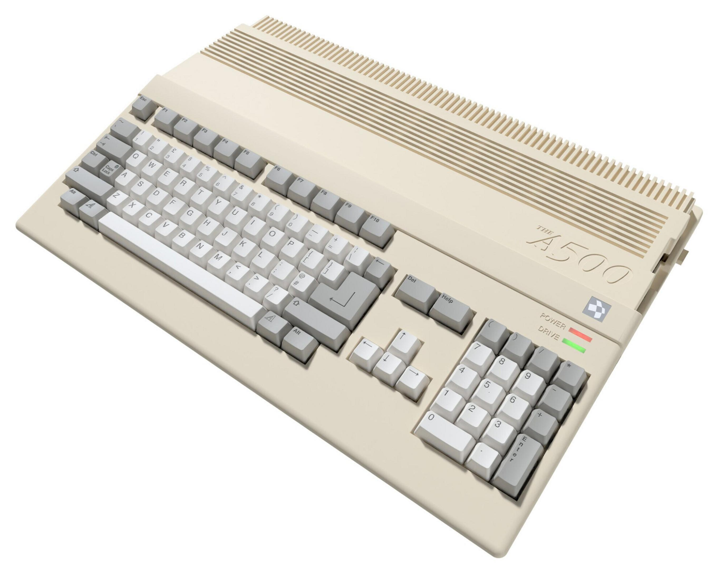 Kremowy komputer Amiga 500. Klawiatura z przodu, główny korpus z tyłu. Klawisze są białe i szare.