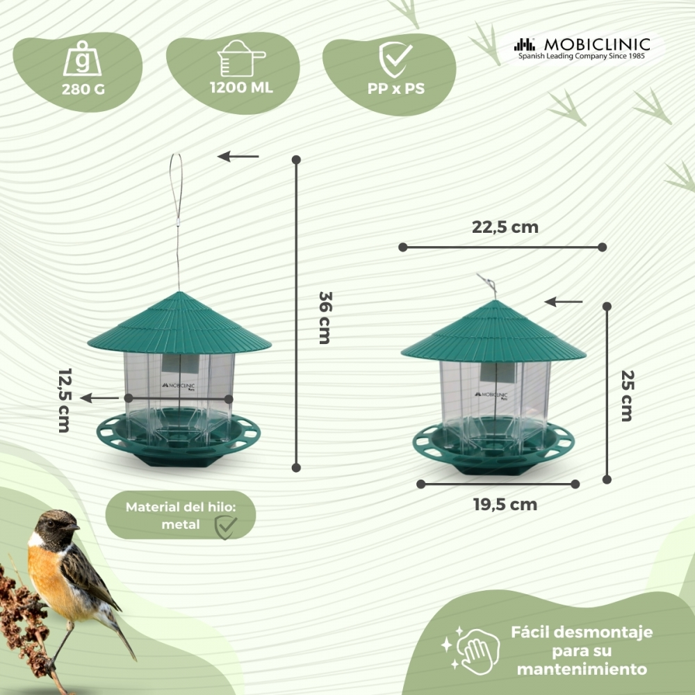 Un comedero verde para pájaros con dimensiones y un pequeño pájaro en una rama. Información sobre peso, capacidad y material.
