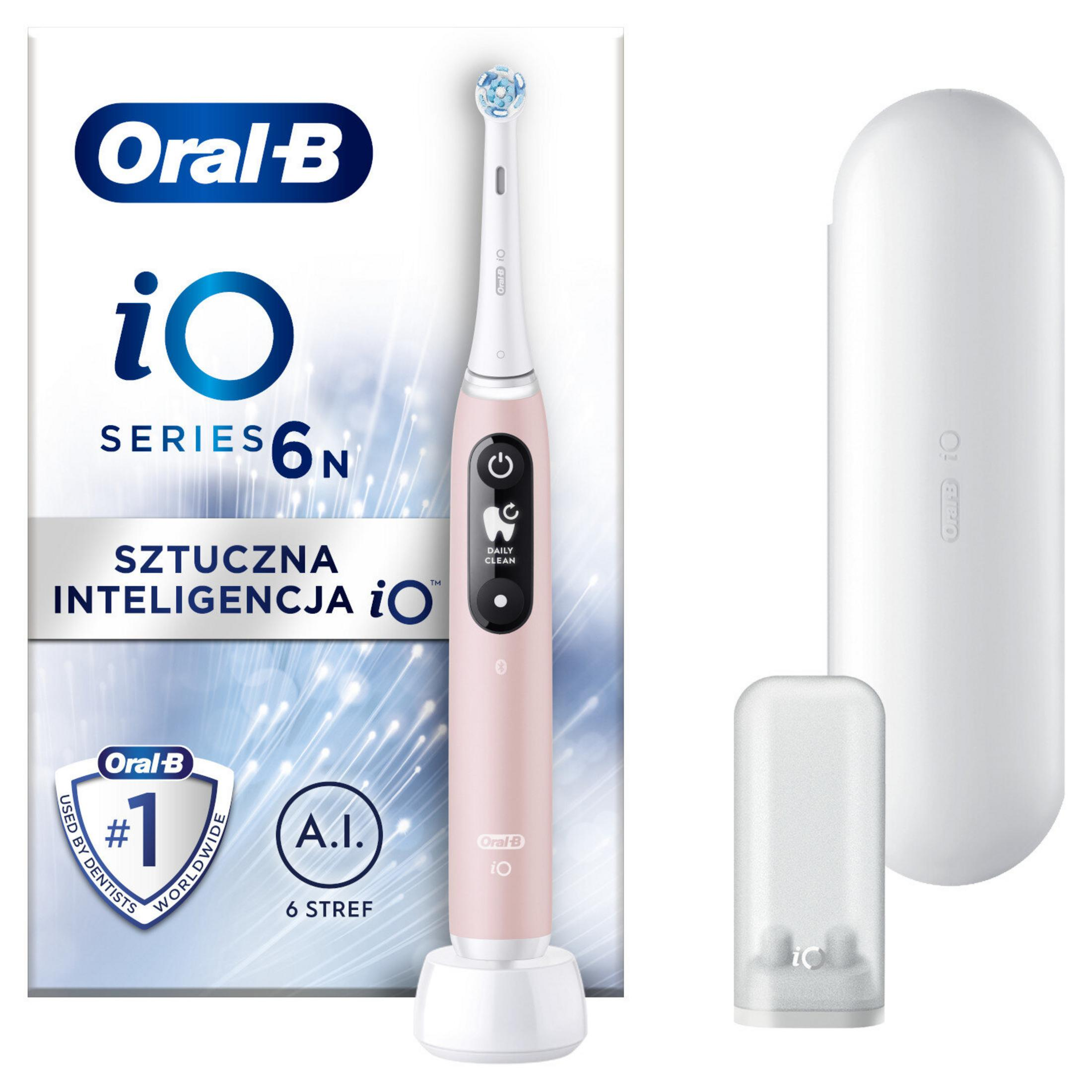 Różowa szczoteczka elektryczna Oral-B iO Series 6N z podstawką ładującą i etui podróżnym. Pudełko w tle.