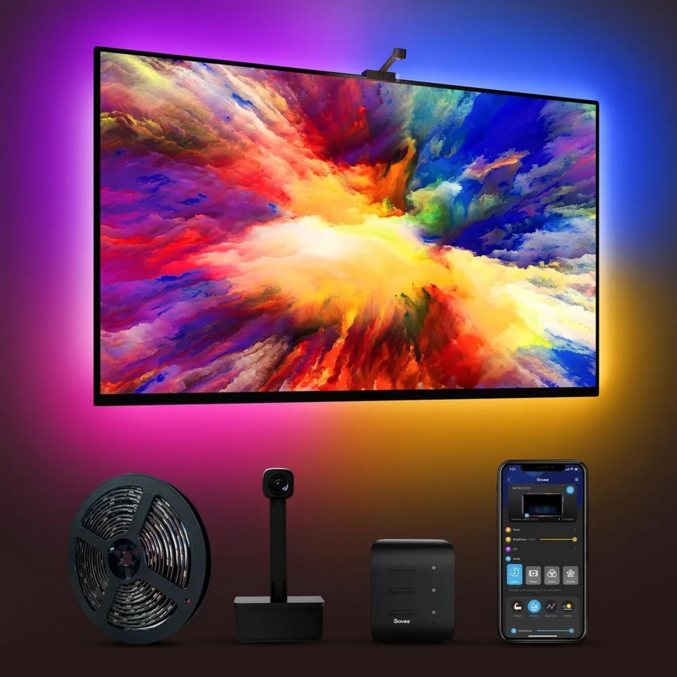 Telewizor z kolorową sztuką abstrakcyjną, listwą świetlną i urządzeniami sterującymi jest wyświetlany.