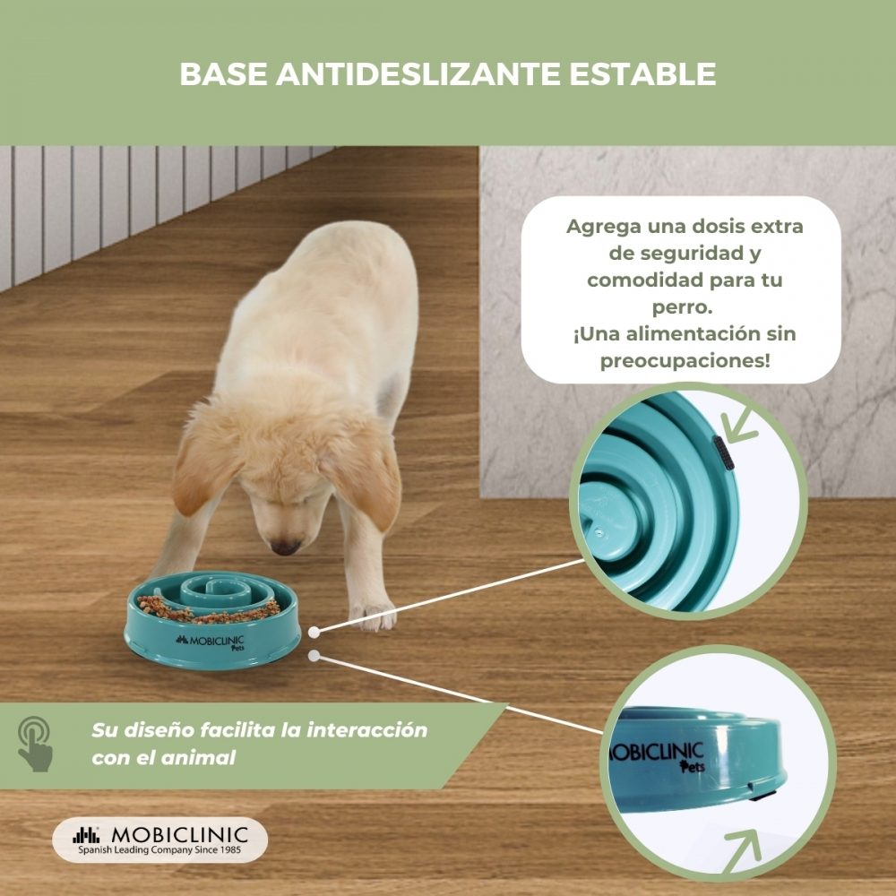 Un perro come de un cuenco azul verdoso para comida lenta sobre madera. El texto promueve la seguridad y facilidad de uso del cuenco.