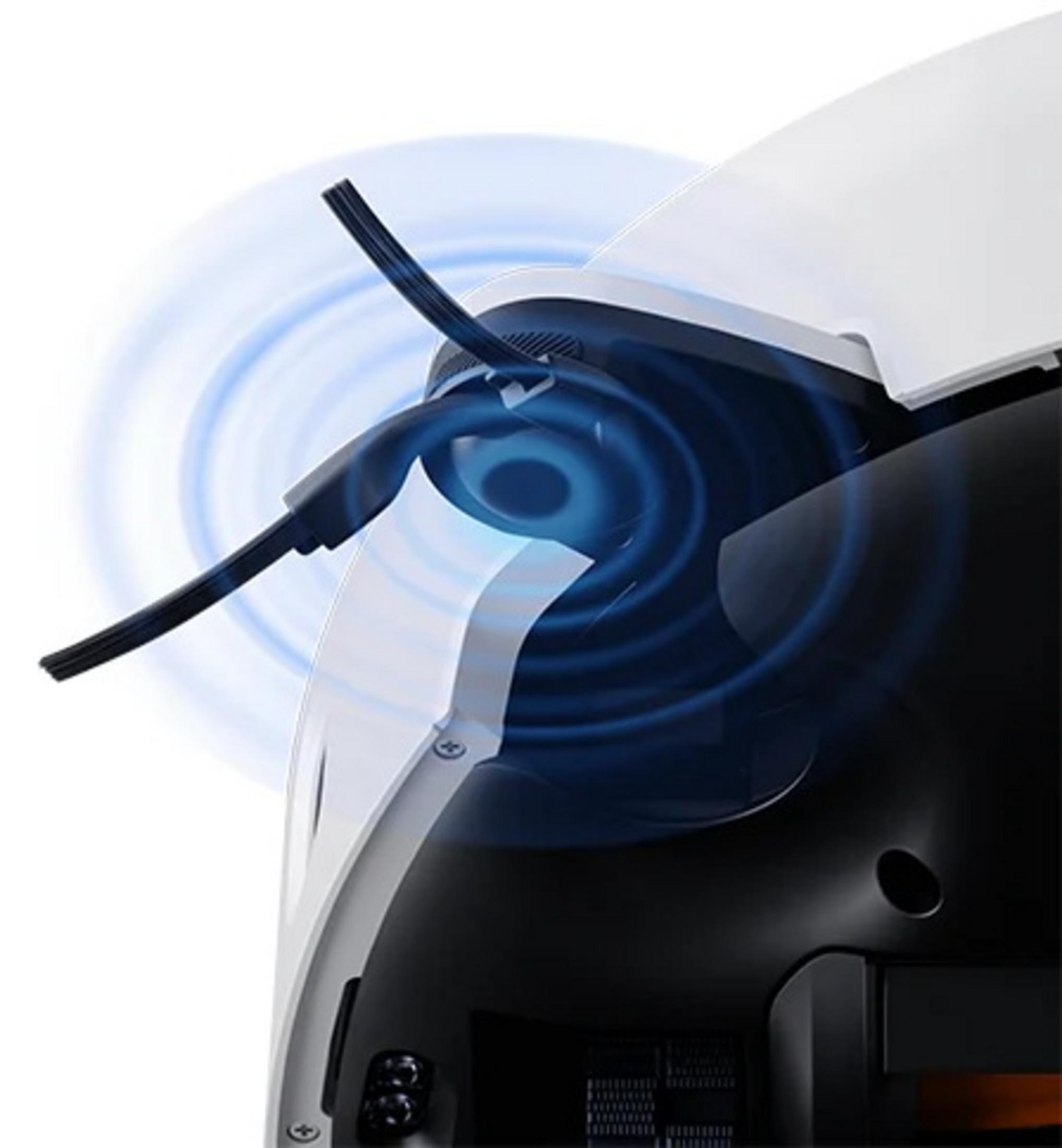 Zbliżenie białego i czarnego robota odkurzającego. Widoczna jest obrotowa szczotka, otoczona niebieskim efektem energetycznym.