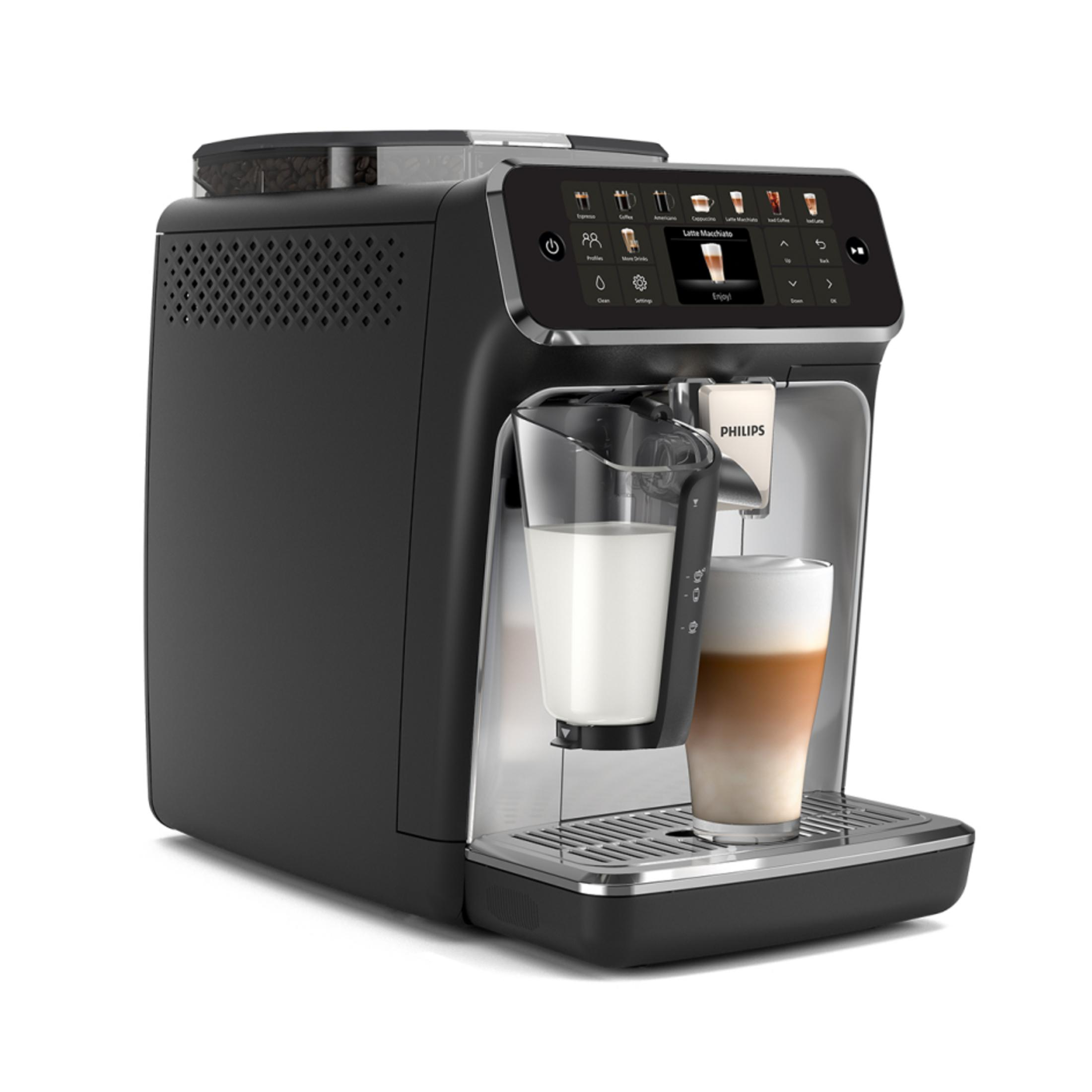 Una macchina per espresso Philips nera con touchscreen, un contenitore per il latte e un bicchiere di latte macchiato.