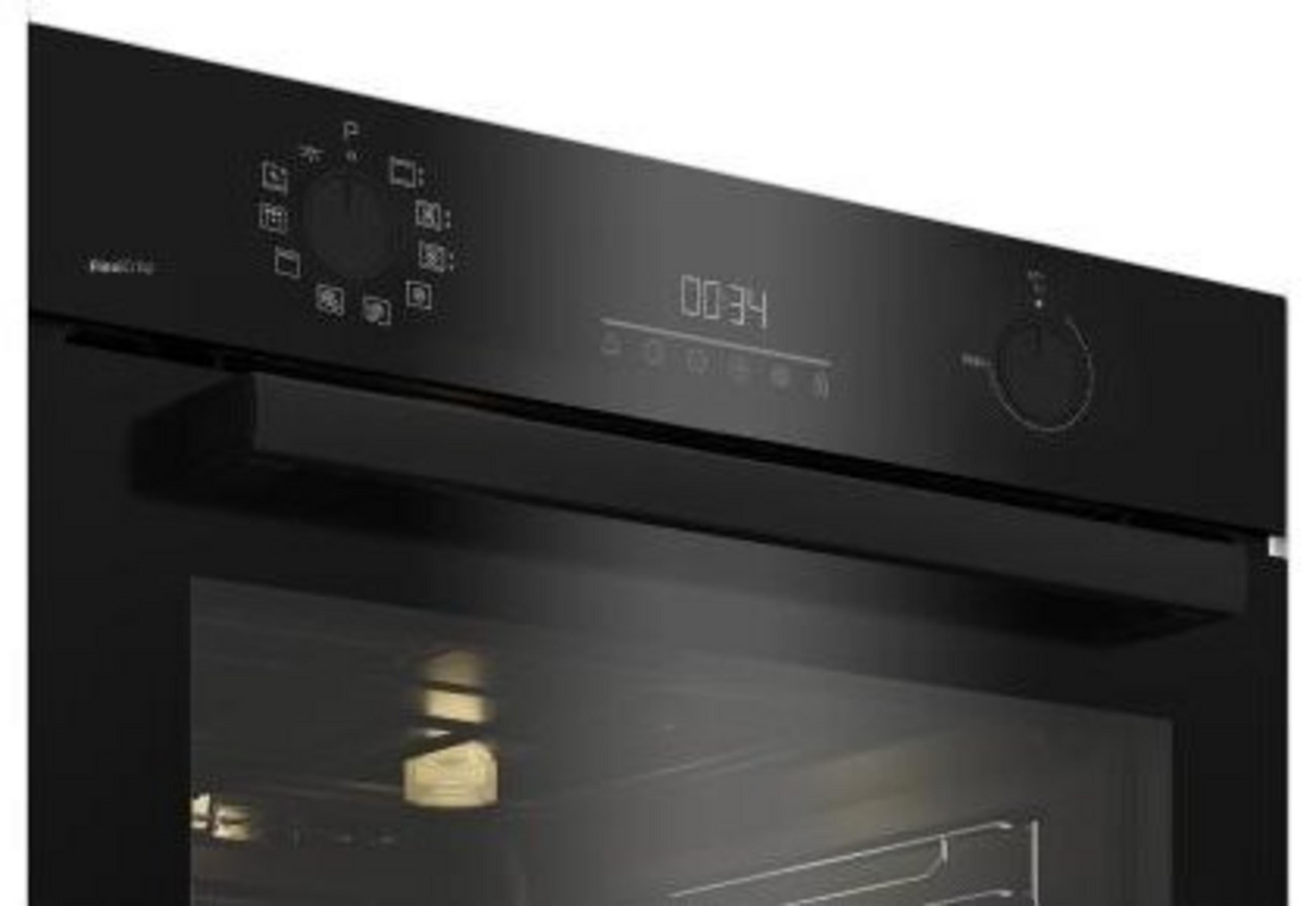 Vista ravvicinata di un pannello di controllo del forno nero con manopole, display digitale che mostra '00:34'.