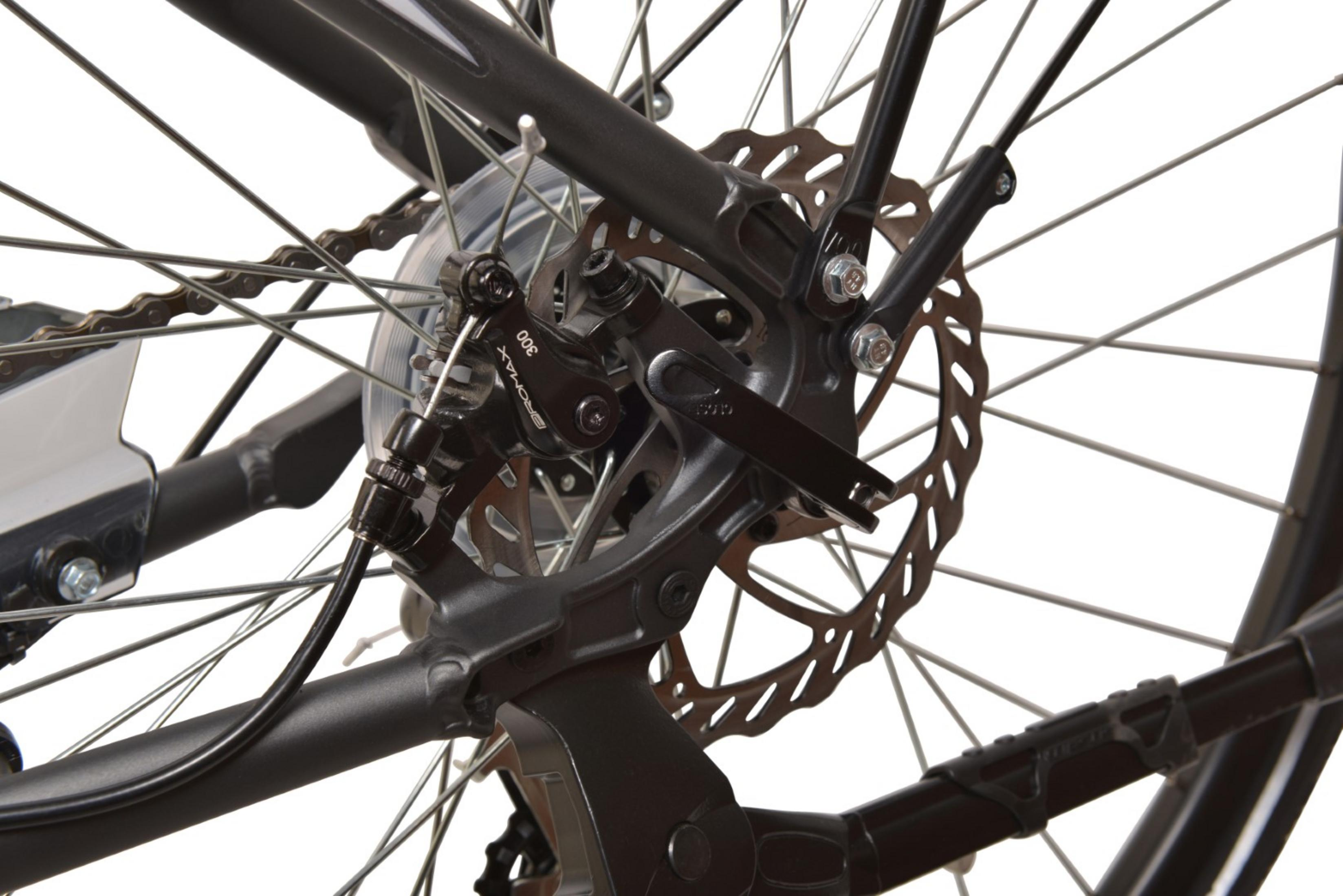 Zbliżenie koła roweru z hamulcem tarczowym. Widoczny łańcuch, szprychy i rama.