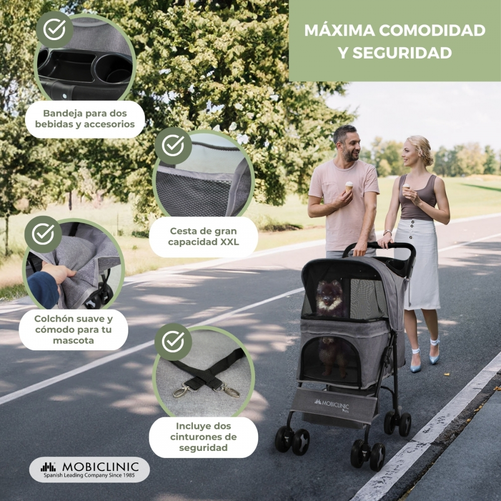 Una pareja pasea con un cochecito para perros, un perro está dentro. El cochecito tiene zona de almacenamiento y cinturones de seguridad. Texto: 'Máxima comodidad y seguridad'.
