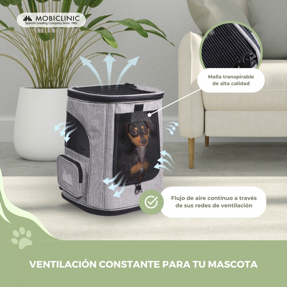 Transportín gris con un perro dentro. Flechas indican flujo de aire. Texto: 'ventilación constante para tu mascota'.