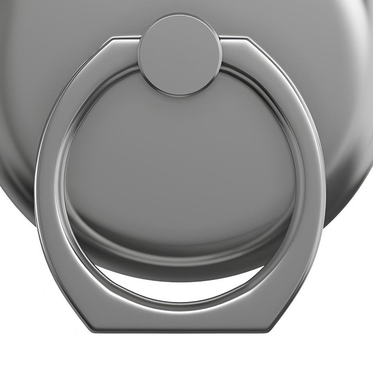 Primer plano de un soporte plateado para anillo de teléfono. El anillo es un rectángulo redondeado con base circular. El fondo está borroso.