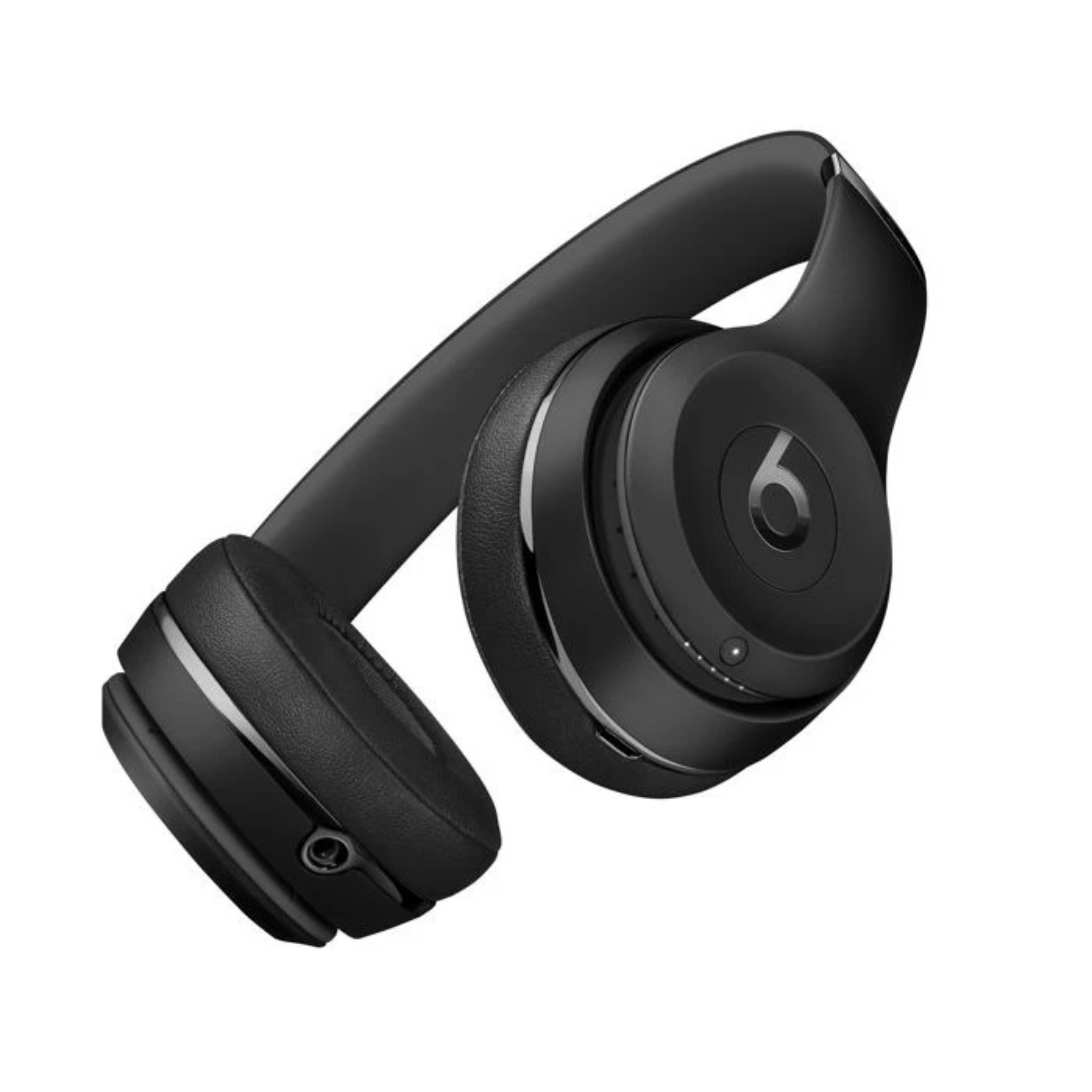 Schwarze Beats-Kopfhörer auf weißem Hintergrund. Die Kopfhörer sind angewinkelt und zeigen die Ohrmuscheln.