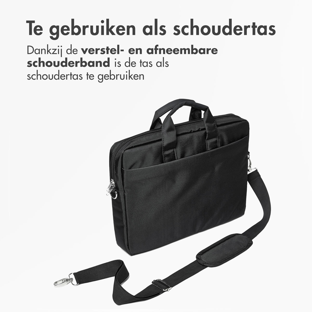 Zwarte aktetas met afneembare schouderriem. Op een wit oppervlak. Tekst bovenaan: te gebruiken als schoudertas.