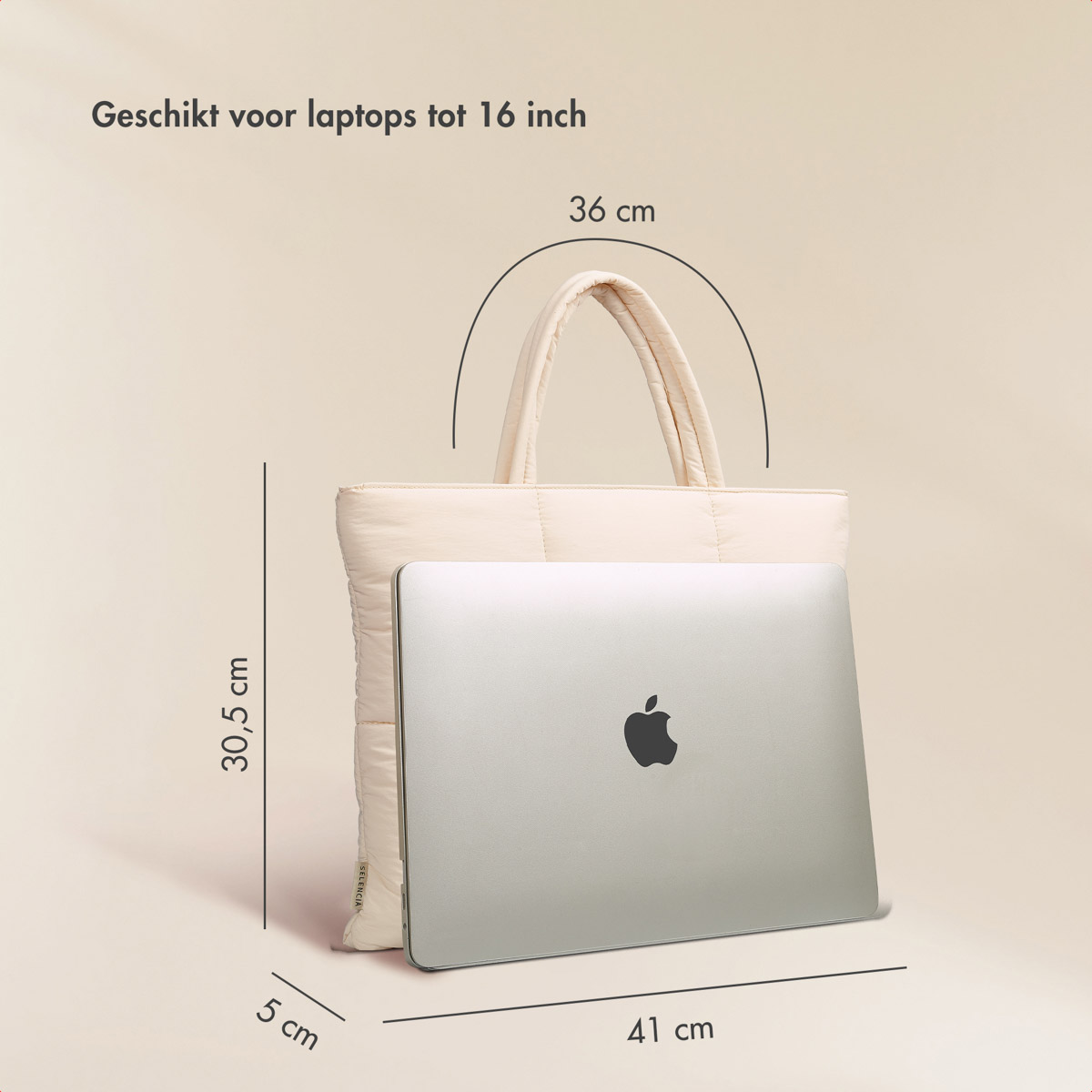 A cream tote bag with a laptop inside. Dimensions are displayed: 30.5 cm, 5 cm, and 41 cm. It fits laptops up to 16 inches.