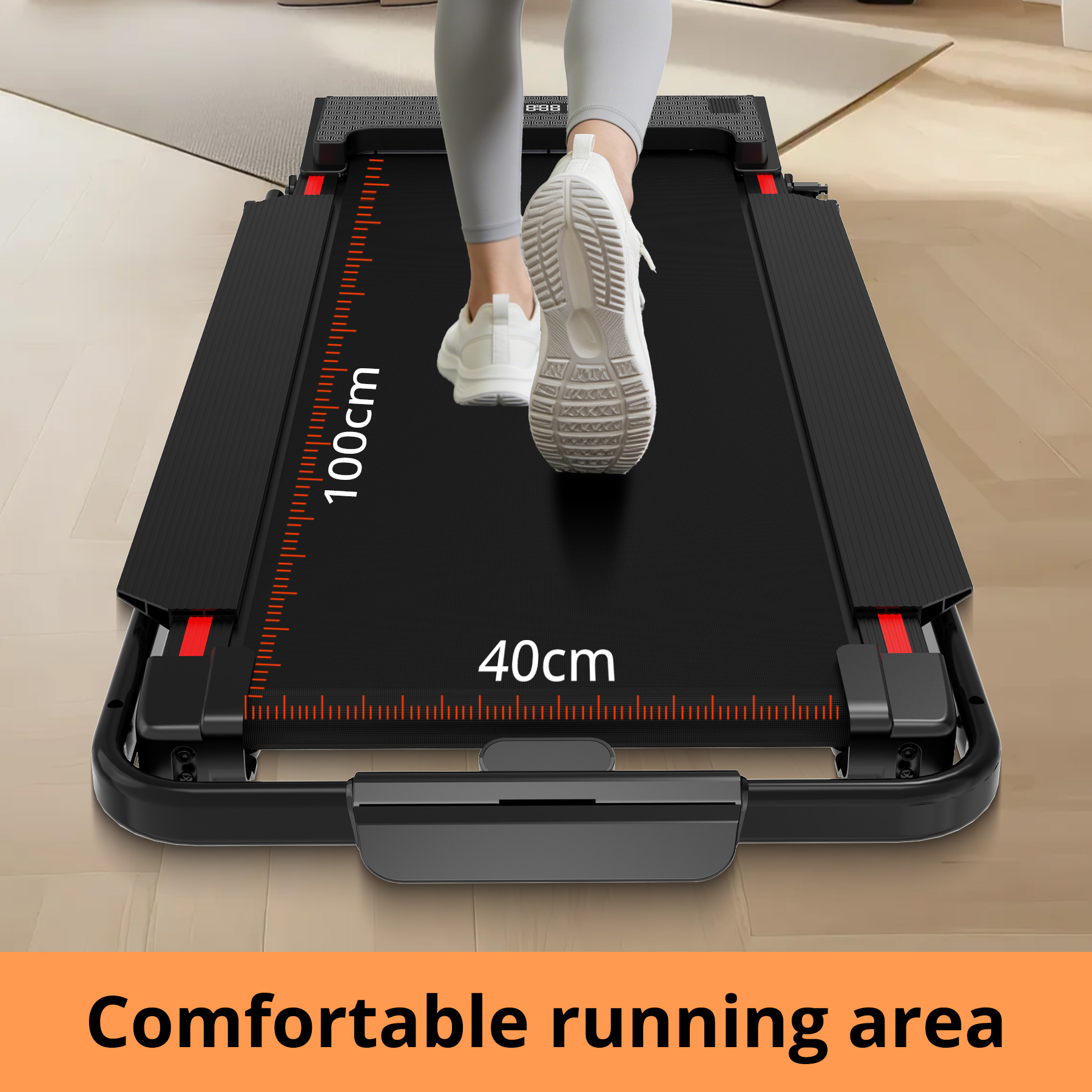 Person walking on a black treadmill. White shoes visible. Dimensions 100cm x 40cm. Comfortable running area is written at the bottom.