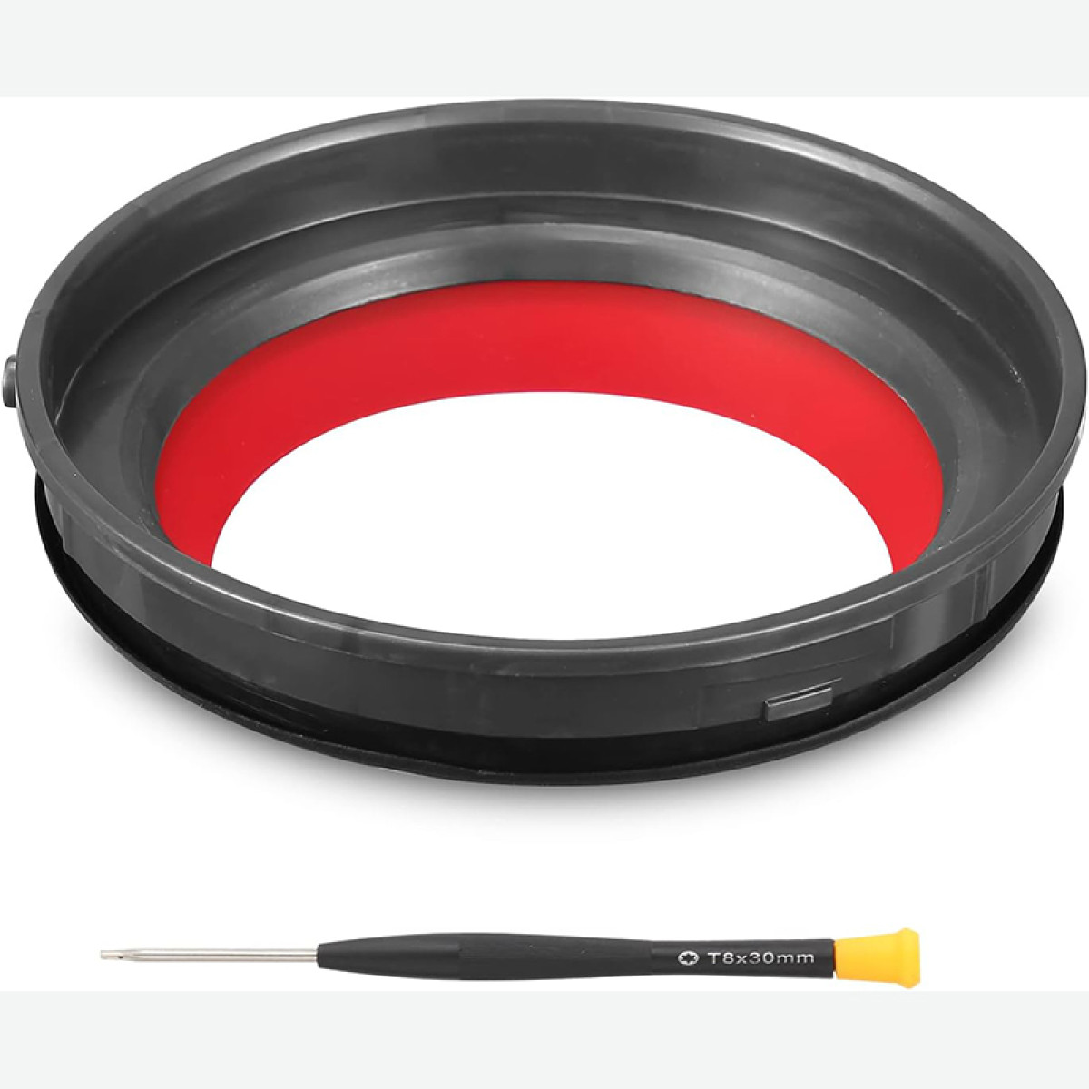 Een zwarte ring met rode inzet en een Torx-schroevendraaier liggen naast elkaar.