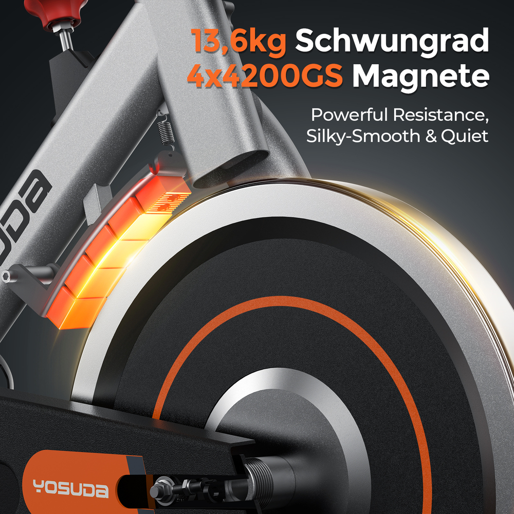 Nahaufnahme des Schwungrads eines Spinbikes mit orangefarbenen Akzenten. Mit 13,6 kg Schwungrad, 4x200GS Magneten.