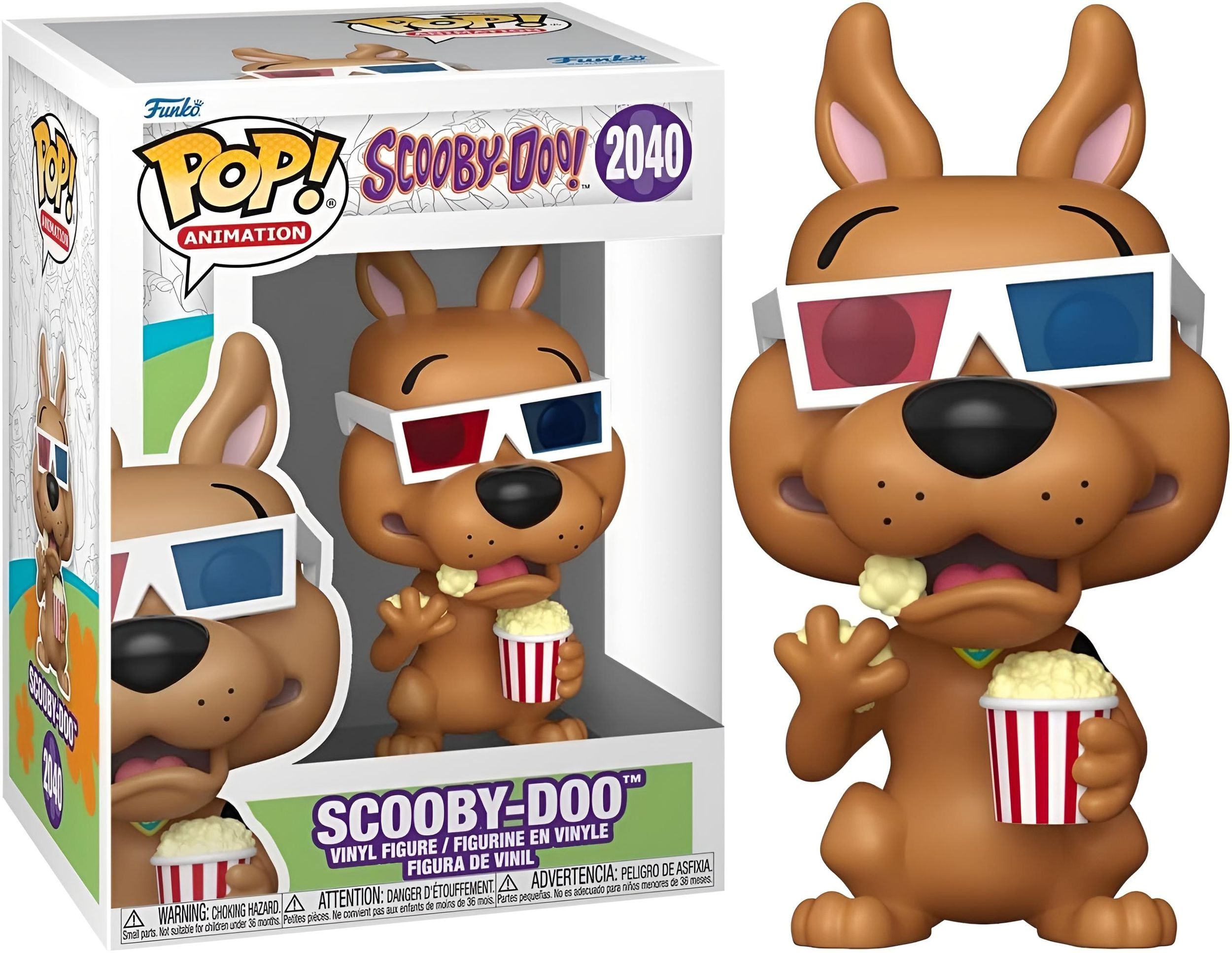 Brauner Hund mit 3D-Brille isst Popcorn, steht in einer Schachtel.