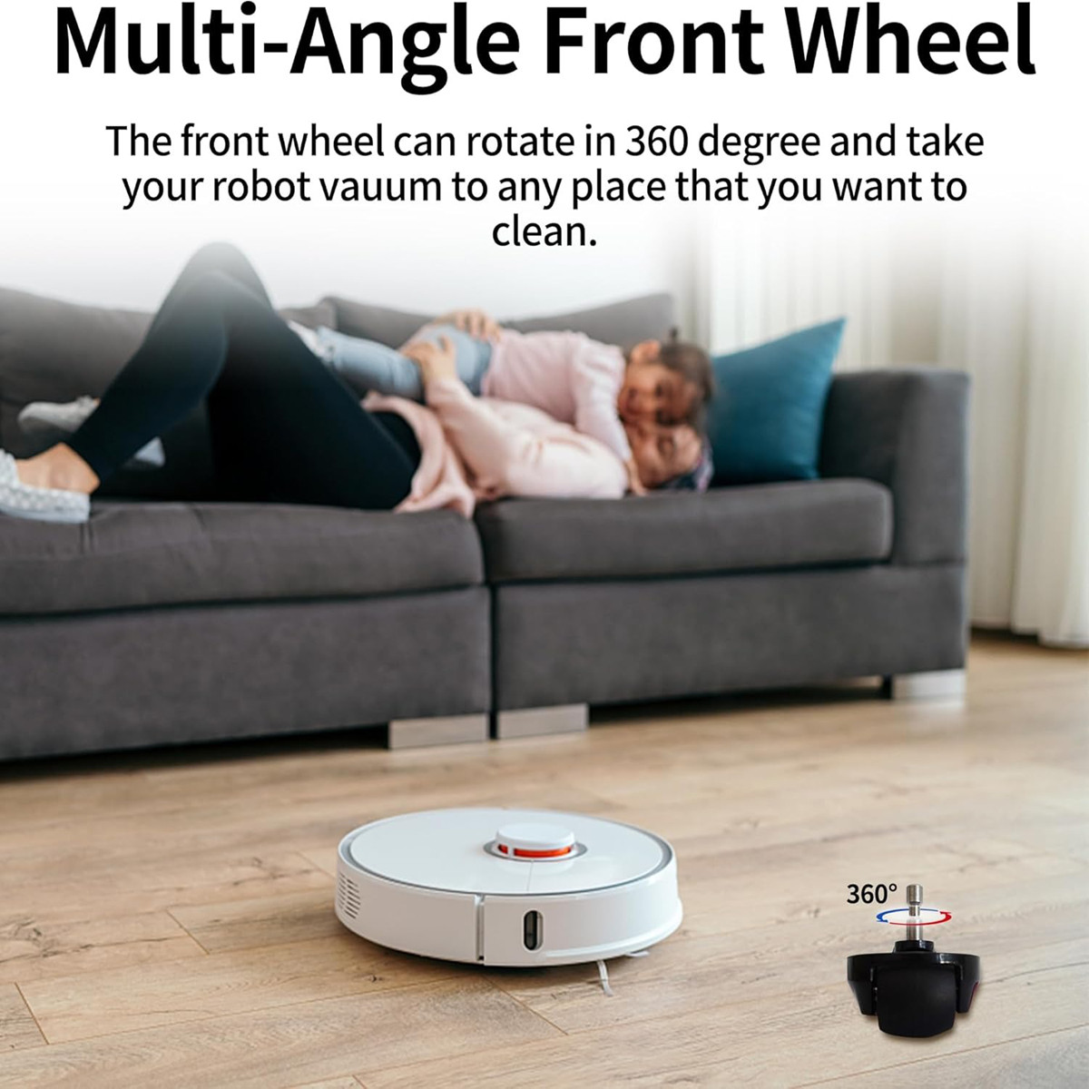 Biały robot sprzątający stoi na drewnianej podłodze przed kanapą, na której leżą kobieta i dziecko.
