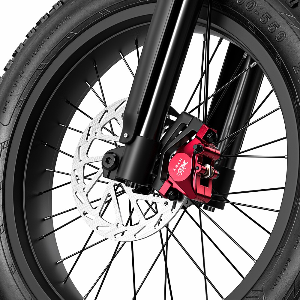 Primer plano de la rueda de una bicicleta con pinza de freno roja y disco.