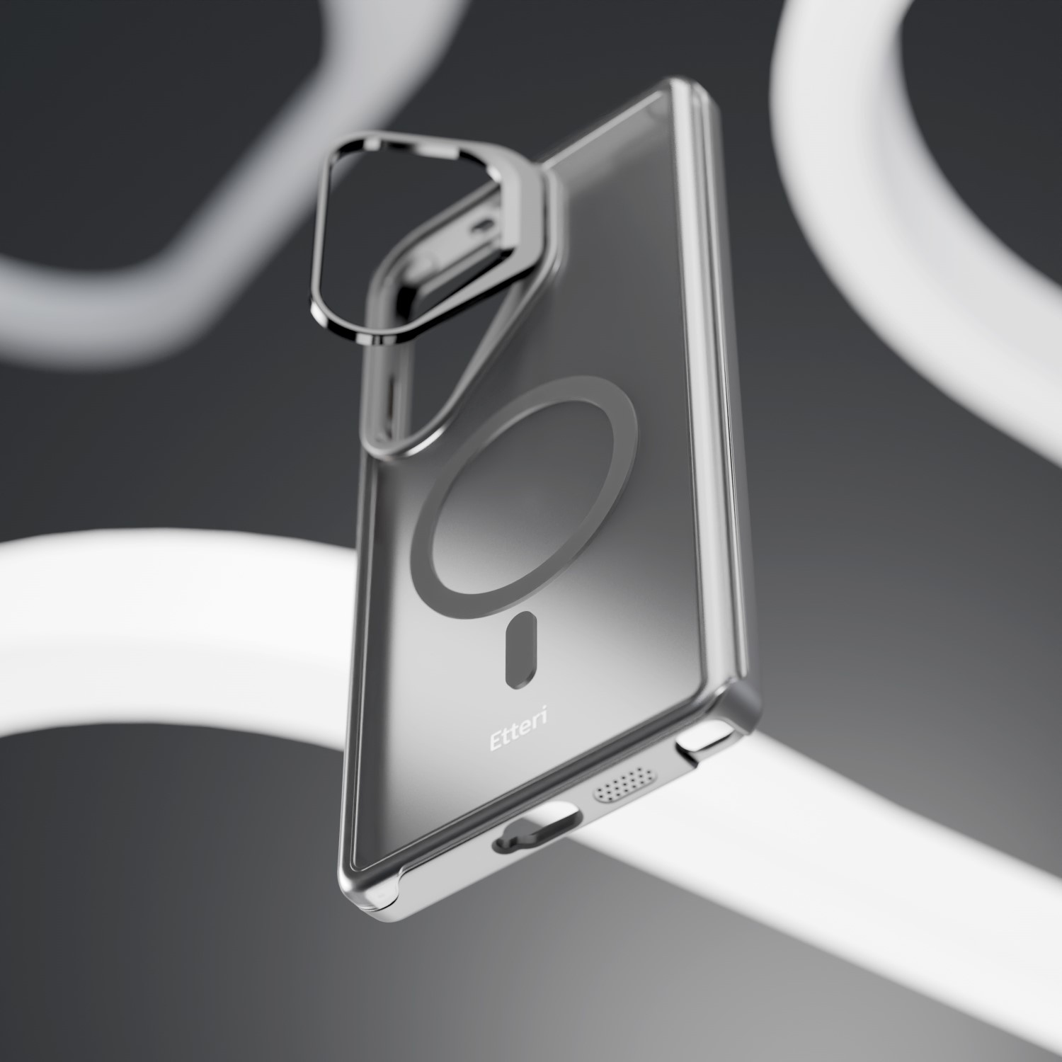 Viene mostrata una custodia trasparente per telefono con supporto ad anello in metallo. La custodia ha un cerchio di ricarica magnetica.