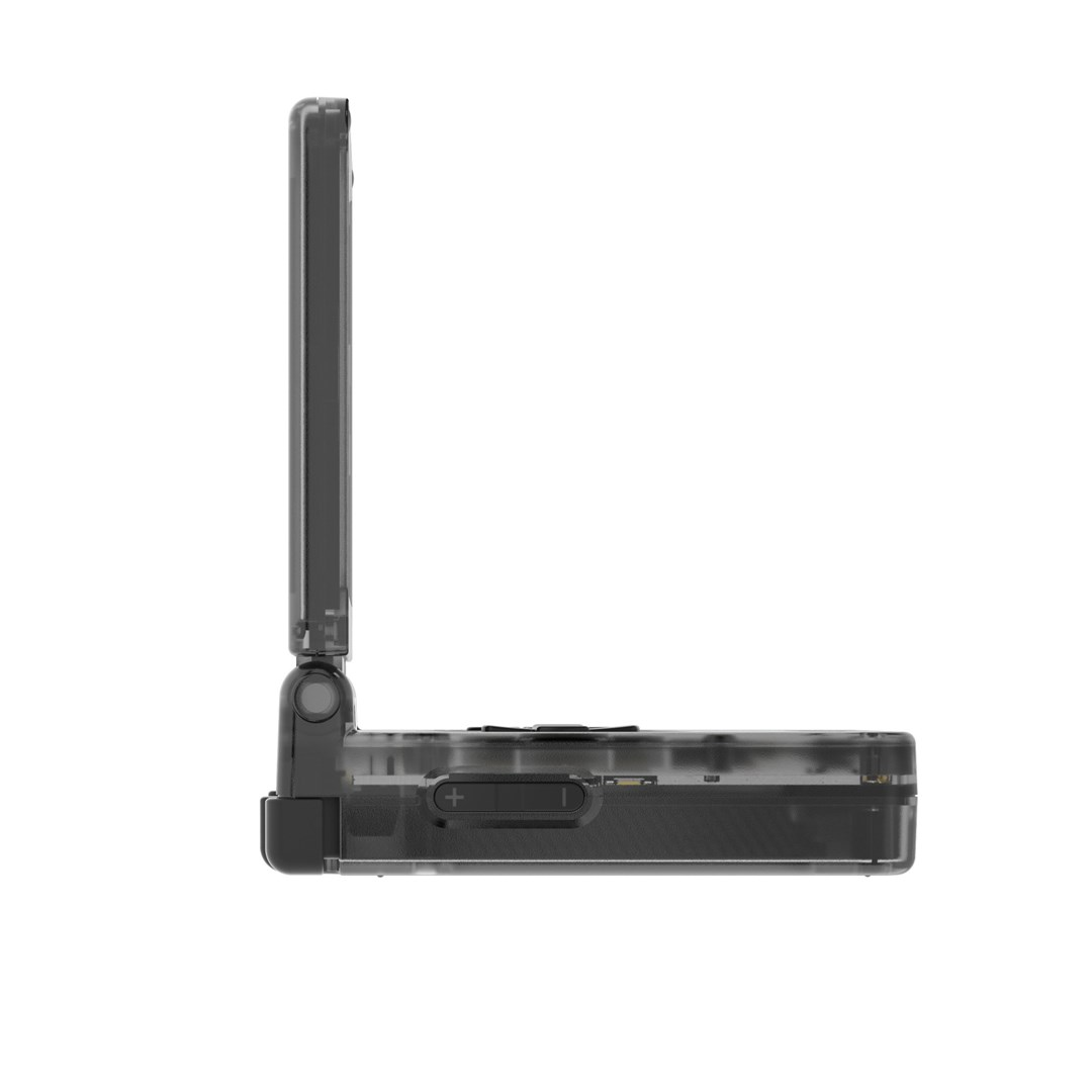 Un teléfono plegable gris oscuro transparente está abierto, mostrando sus componentes internos.