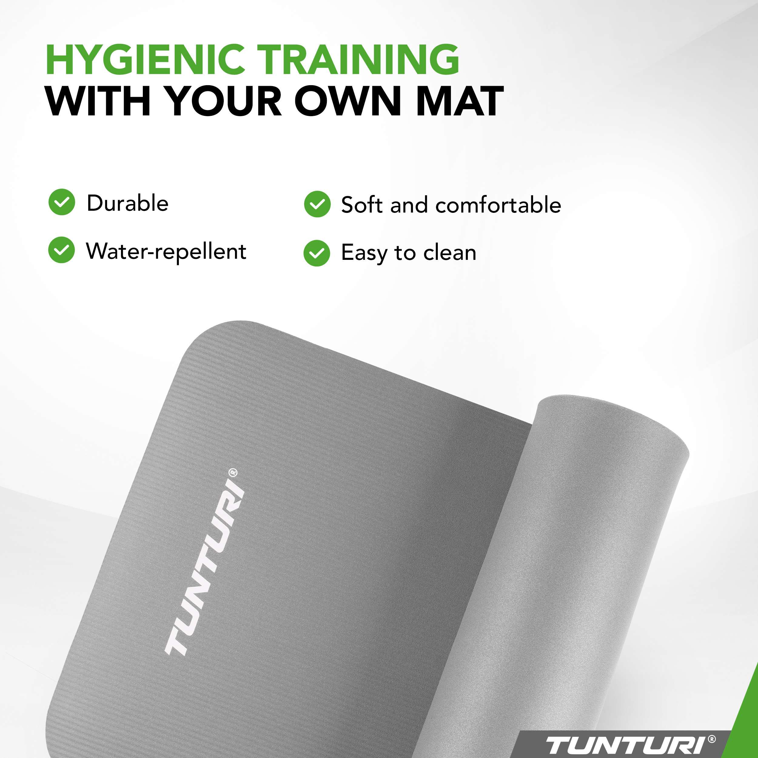 Een grijze Tunturi yogamat, opgerold, met tekst die de voordelen van hygiënisch trainen benadrukt.