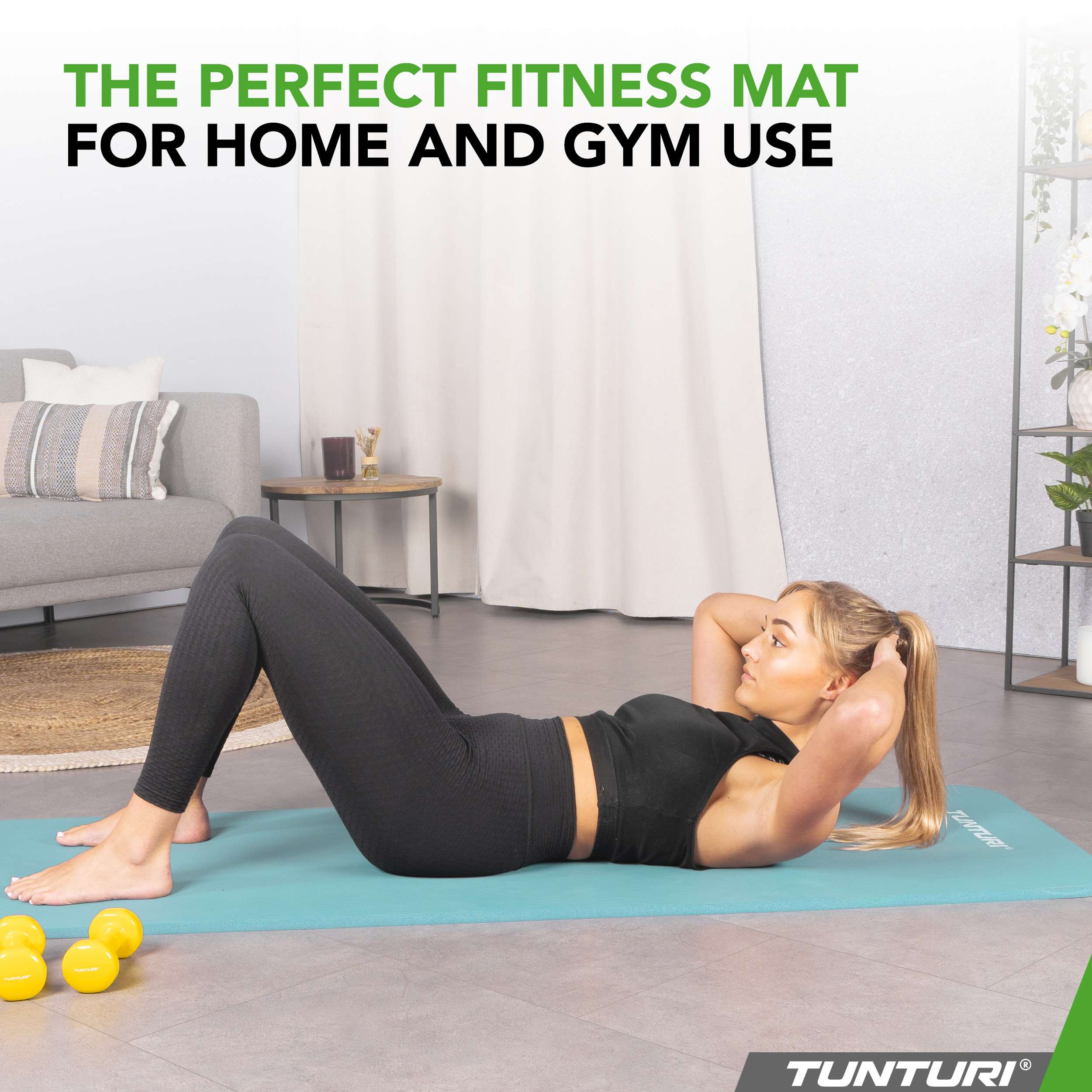 Woman doing crunches on a turquoise fitness mat, yellow dumbbells nearby.