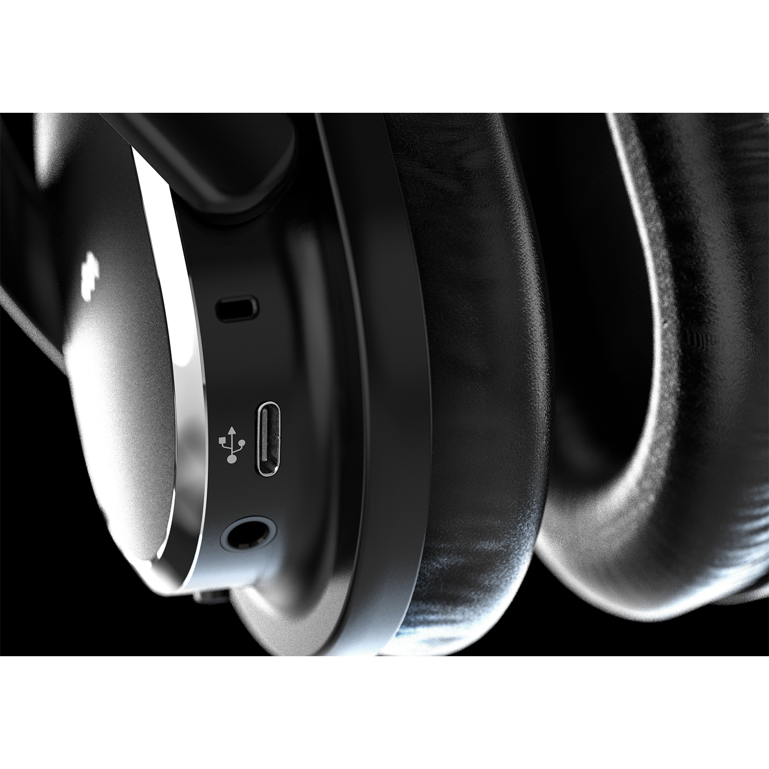 Czarne słuchawki z portem USB-C i gniazdem audio.