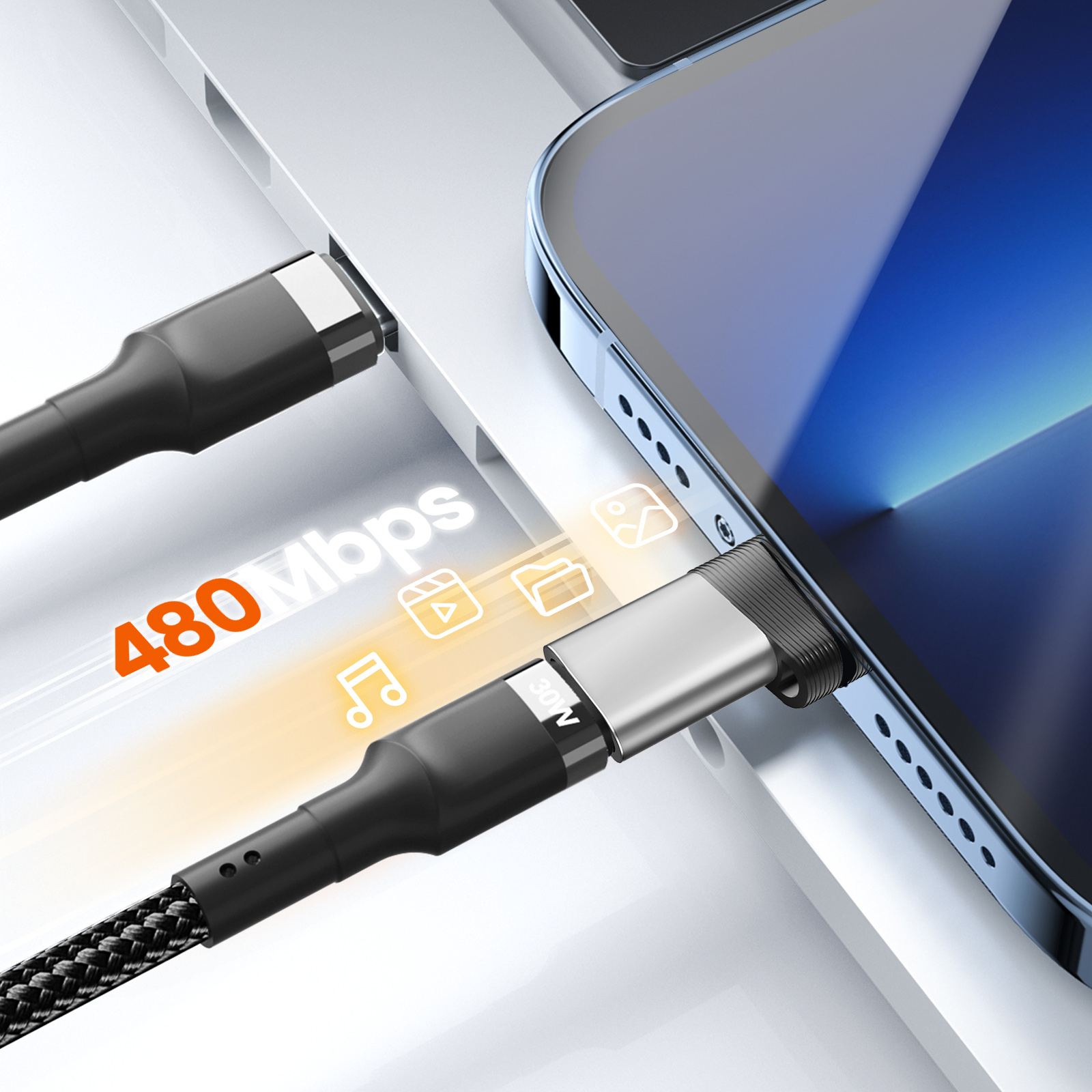 Cavo USB-C nero collegato a telefono e laptop. Mostra velocità di 480 Mbps.