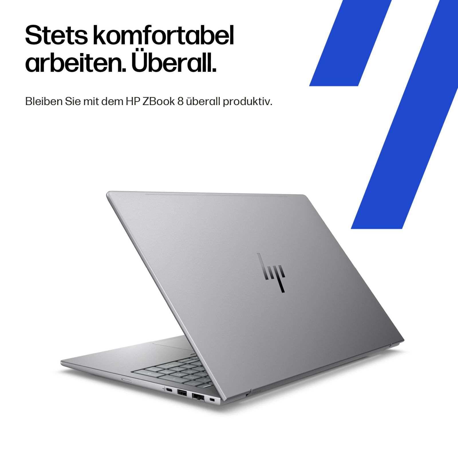 Srebrny laptop HP ZBook otwarty, klawiatura i porty widoczne. Tekst po niemiecku.