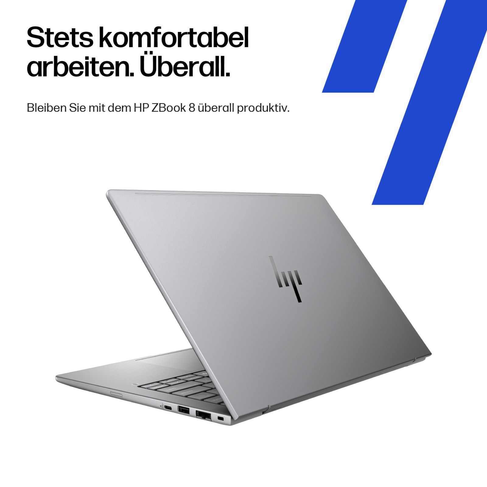 Srebrny laptop HP z otwartym ekranem i logo.