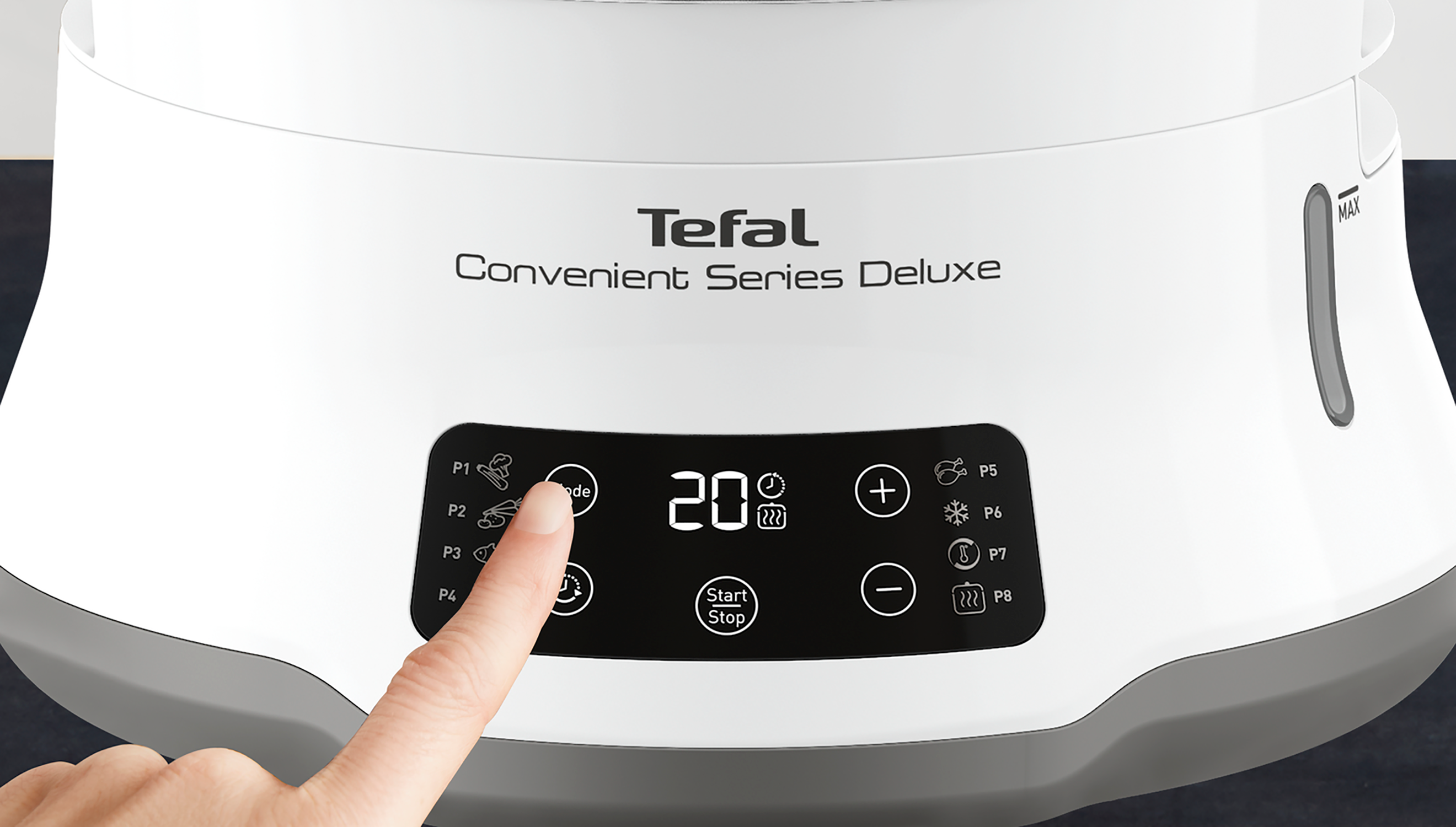 Ein Finger drückt die 'Modus'-Taste auf einem weißen Tefal-Gerät mit Digitalanzeige, die 20 zeigt.