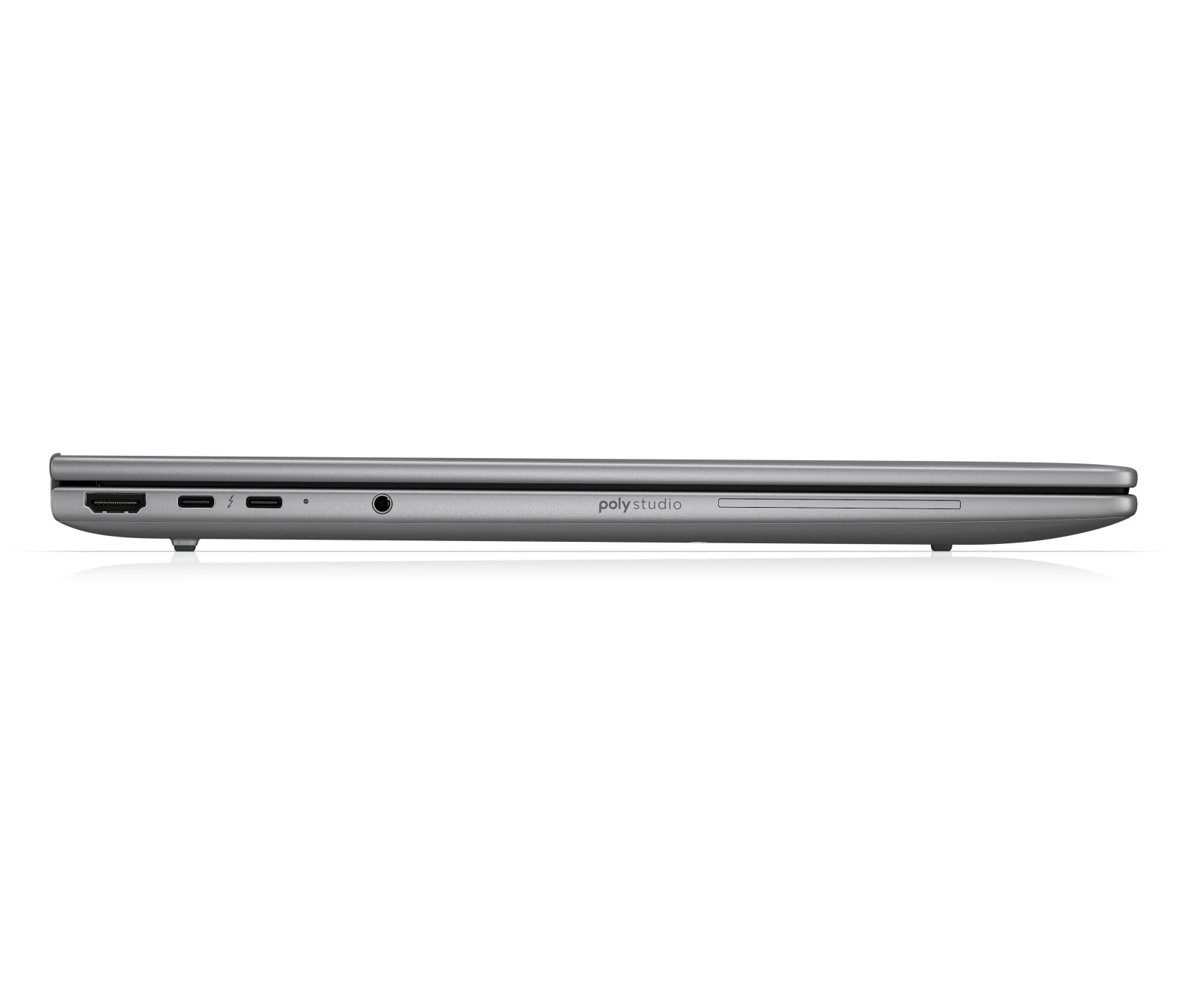 Widok z boku zamkniętego szarego laptopa, z portami i logo.
