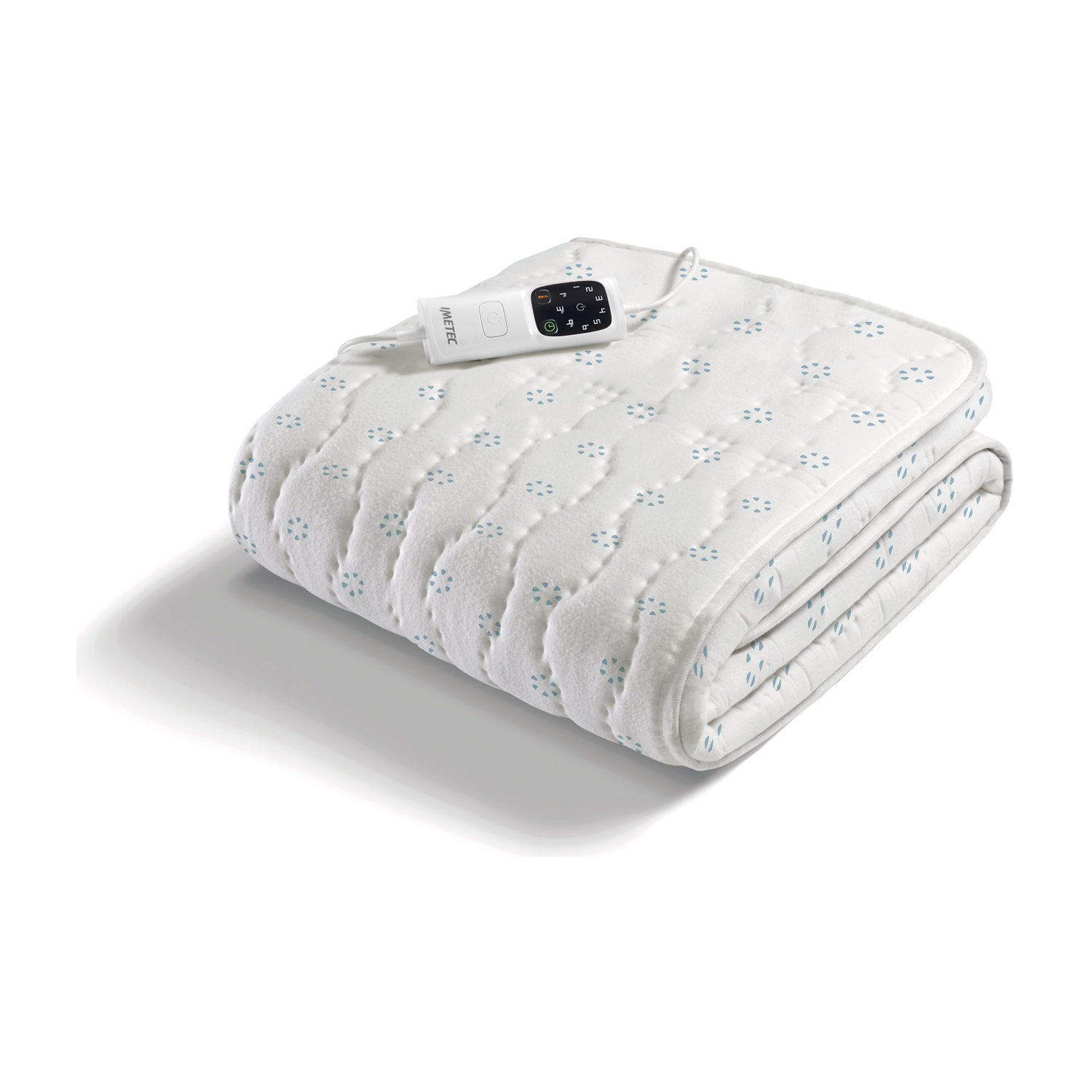 Una coperta elettrica bianca con motivi blu e un controller bianco.