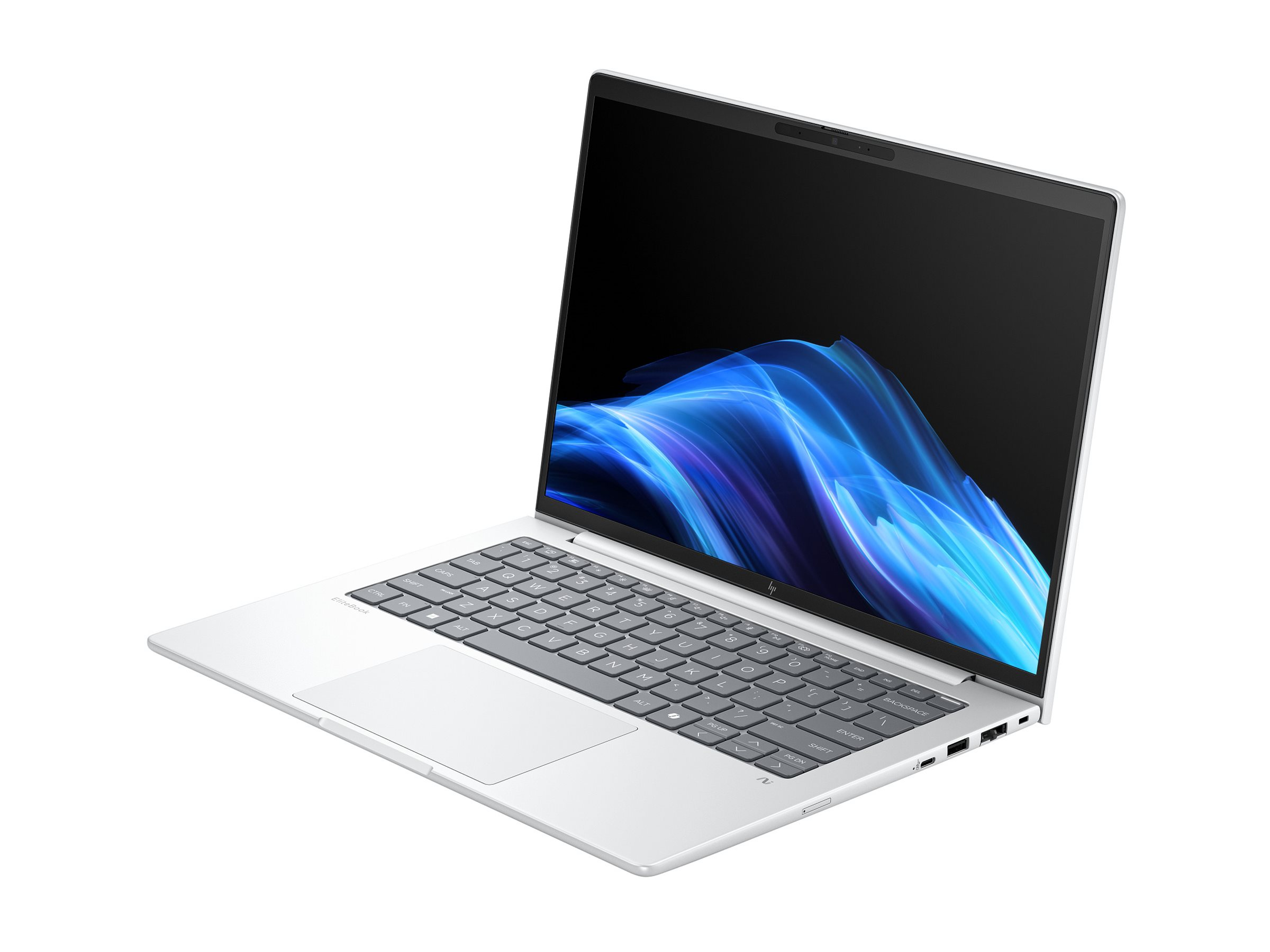 Un laptop argentato con tastiera e touchpad retroilluminati, sfondo bianco.