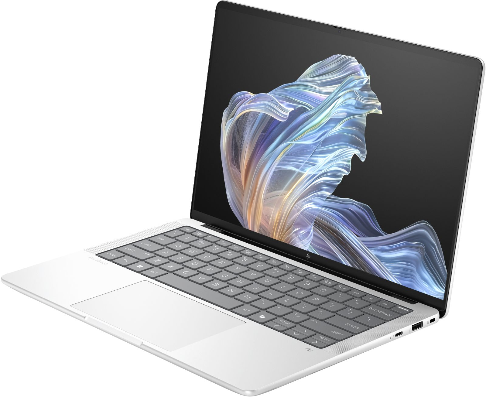 Un laptop argentato con uno sfondo astratto e colorato sullo schermo.