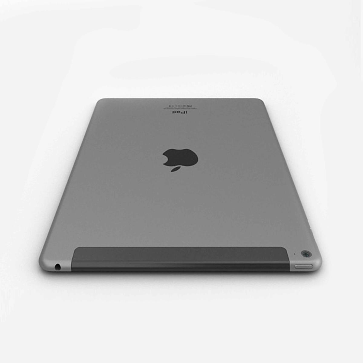 Un iPad grigio con il logo Apple è mostrato da un'angolazione bassa su sfondo bianco.