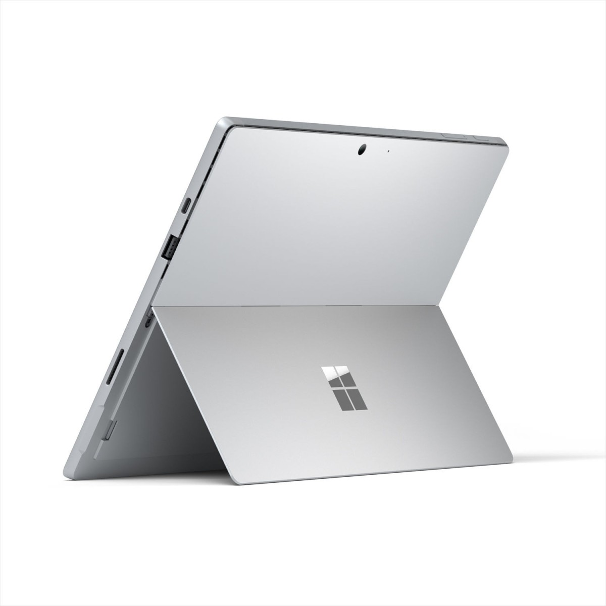 Tablet Microsoft Surface Pro argento con cavalletto aperto, porta USB e logo Windows.