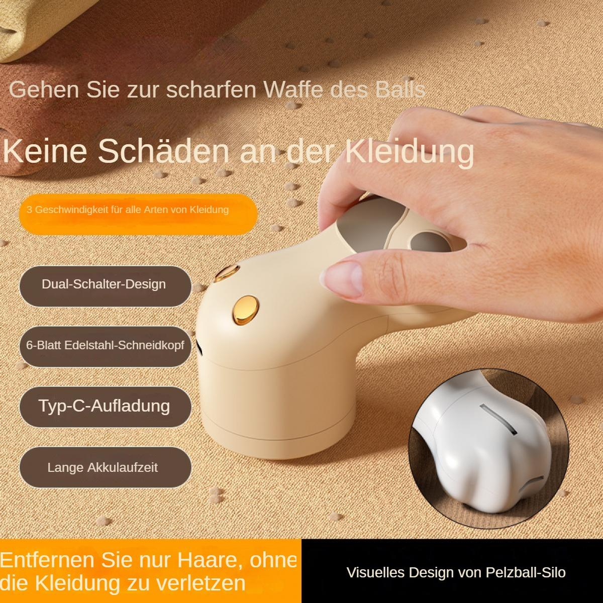 Ein beiger Fusselentferner mit goldenen Knöpfen wird von einer Hand gehalten.