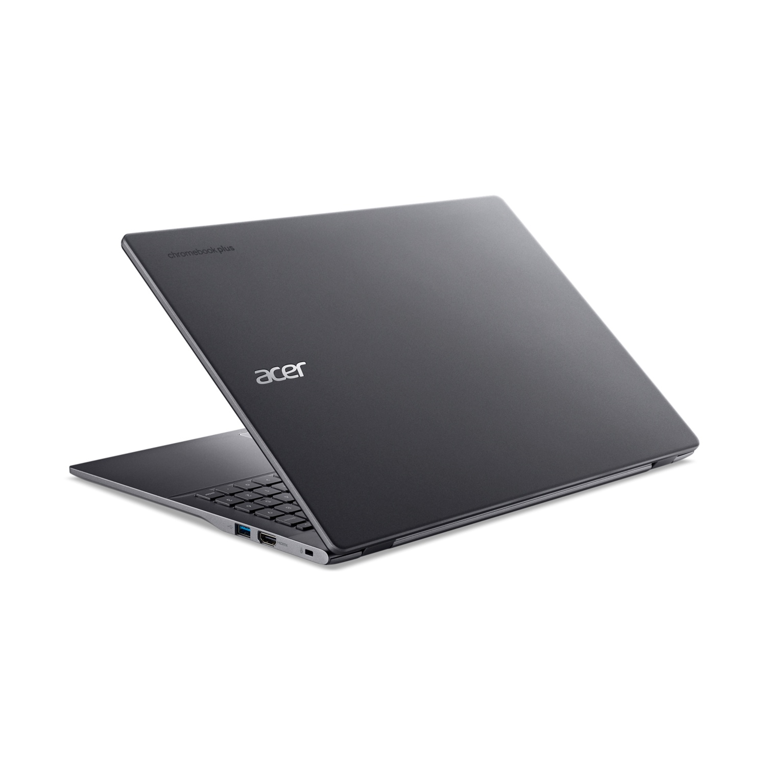 Un laptop Acer Chromebook Plus grigio scuro è aperto, mostra la tastiera e le porte a sinistra.