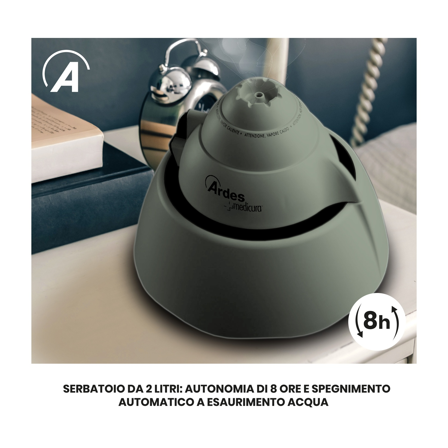 Un humidificador gris con tanque de 2L y 8h de autonomía en una mesita de noche.