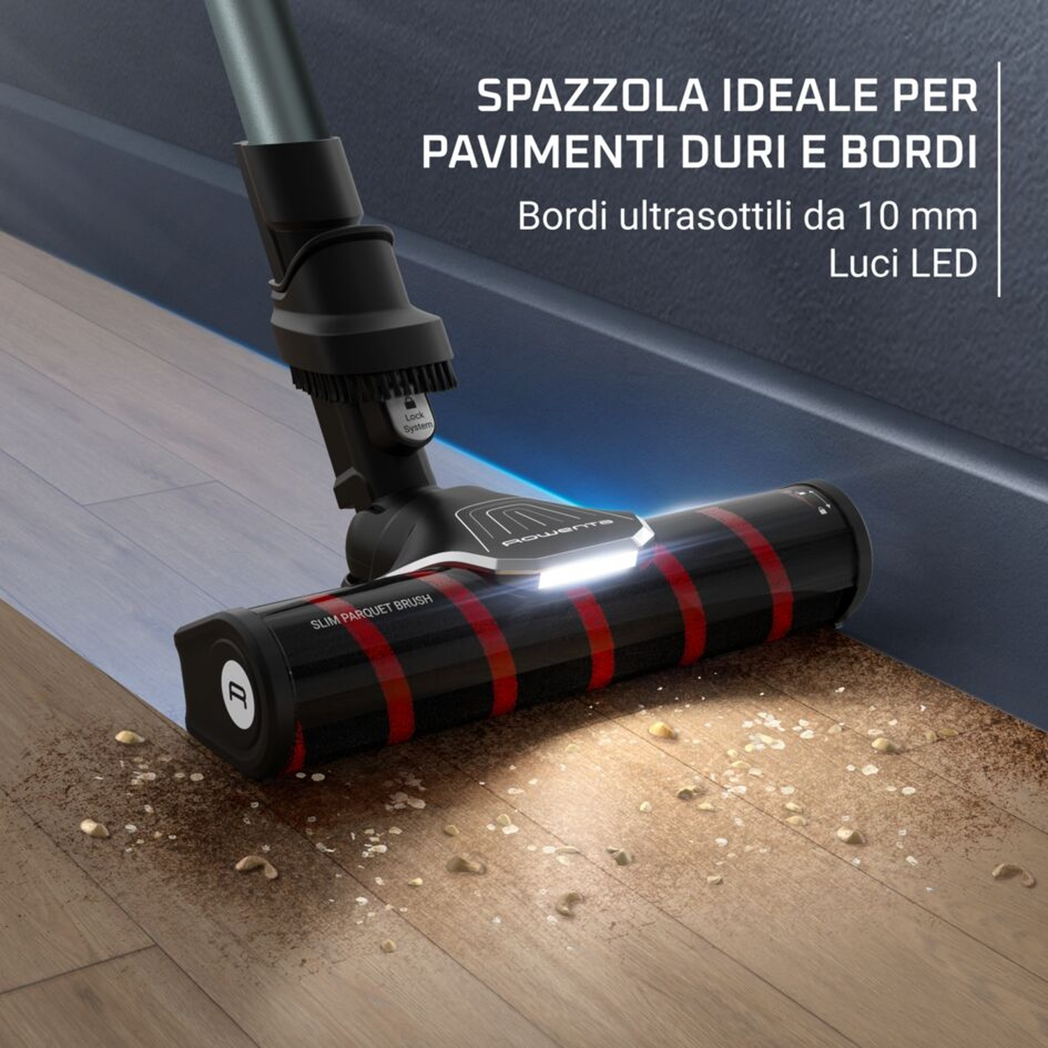 Un cabezal de aspiradora con luces LED limpia la suciedad de un suelo de madera.