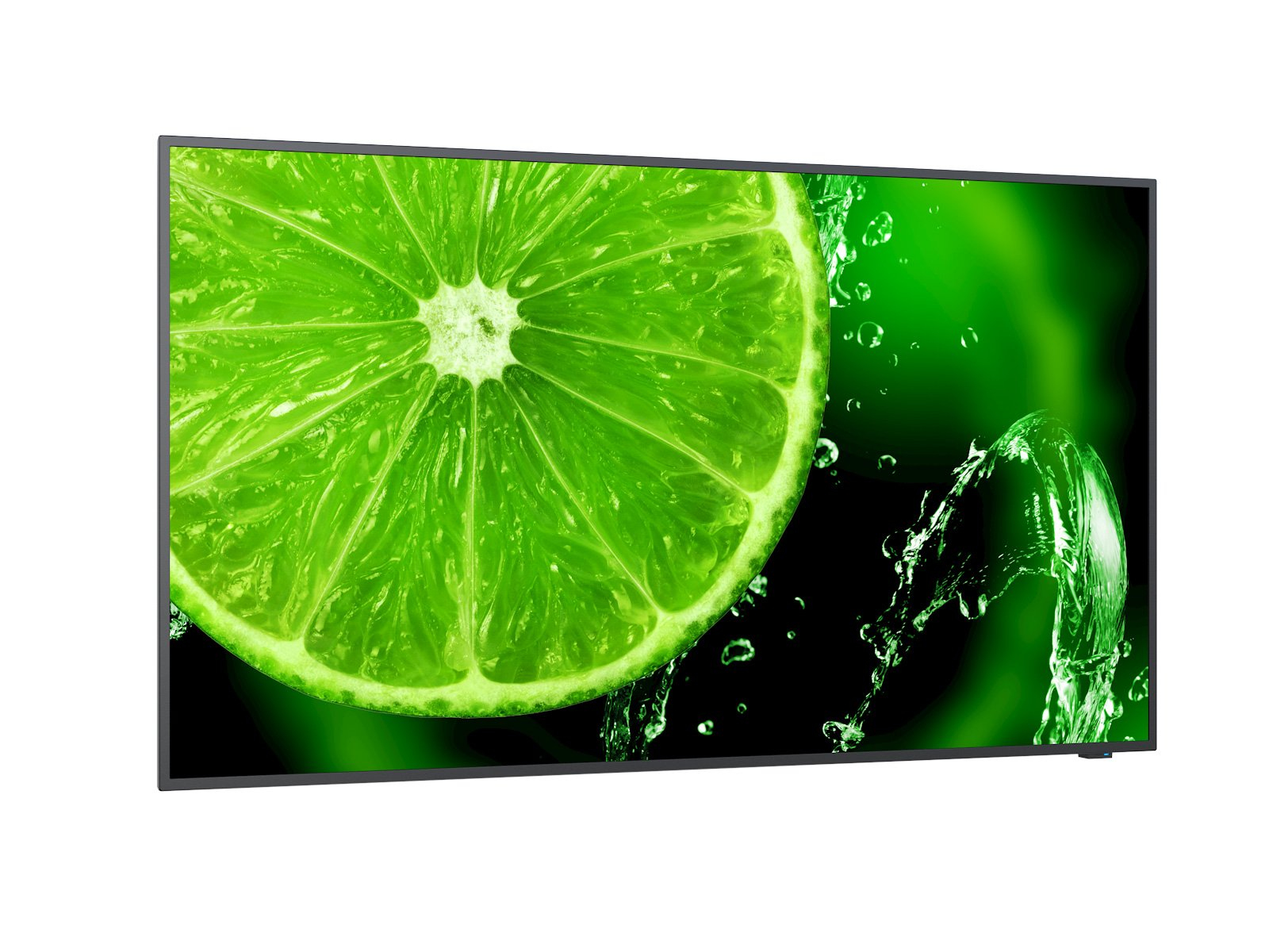 Un primo piano di una fetta di lime verde brillante con schizzi d'acqua.
