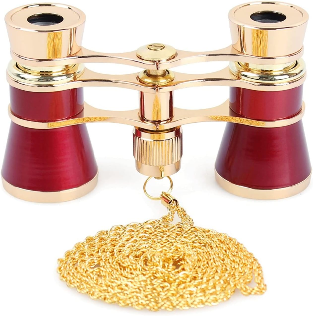 Rote Operngläser mit goldenen Akzenten und einer goldenen Kette liegen auf weißem Untergrund.